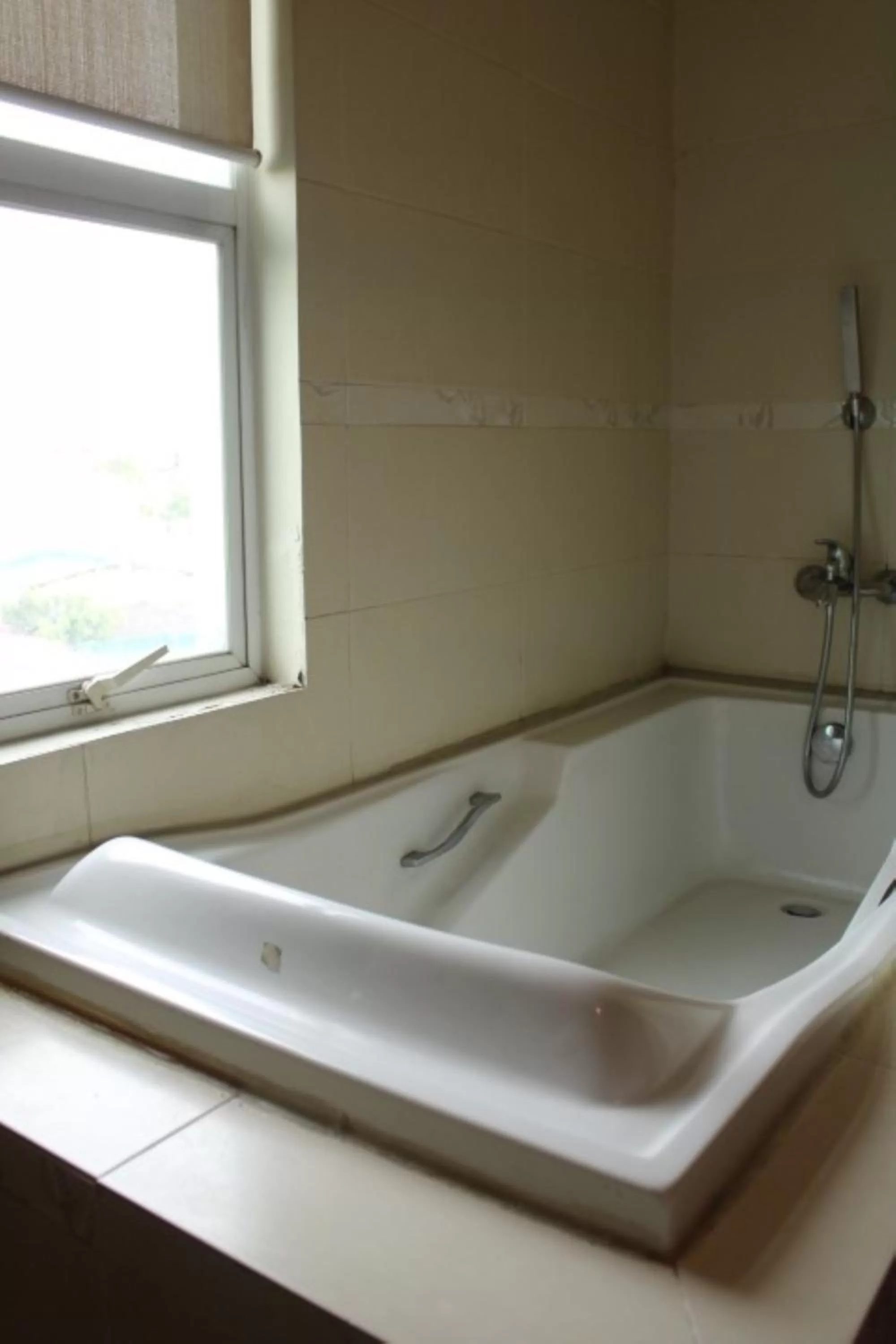 Bathroom in Festive Hotel Makati