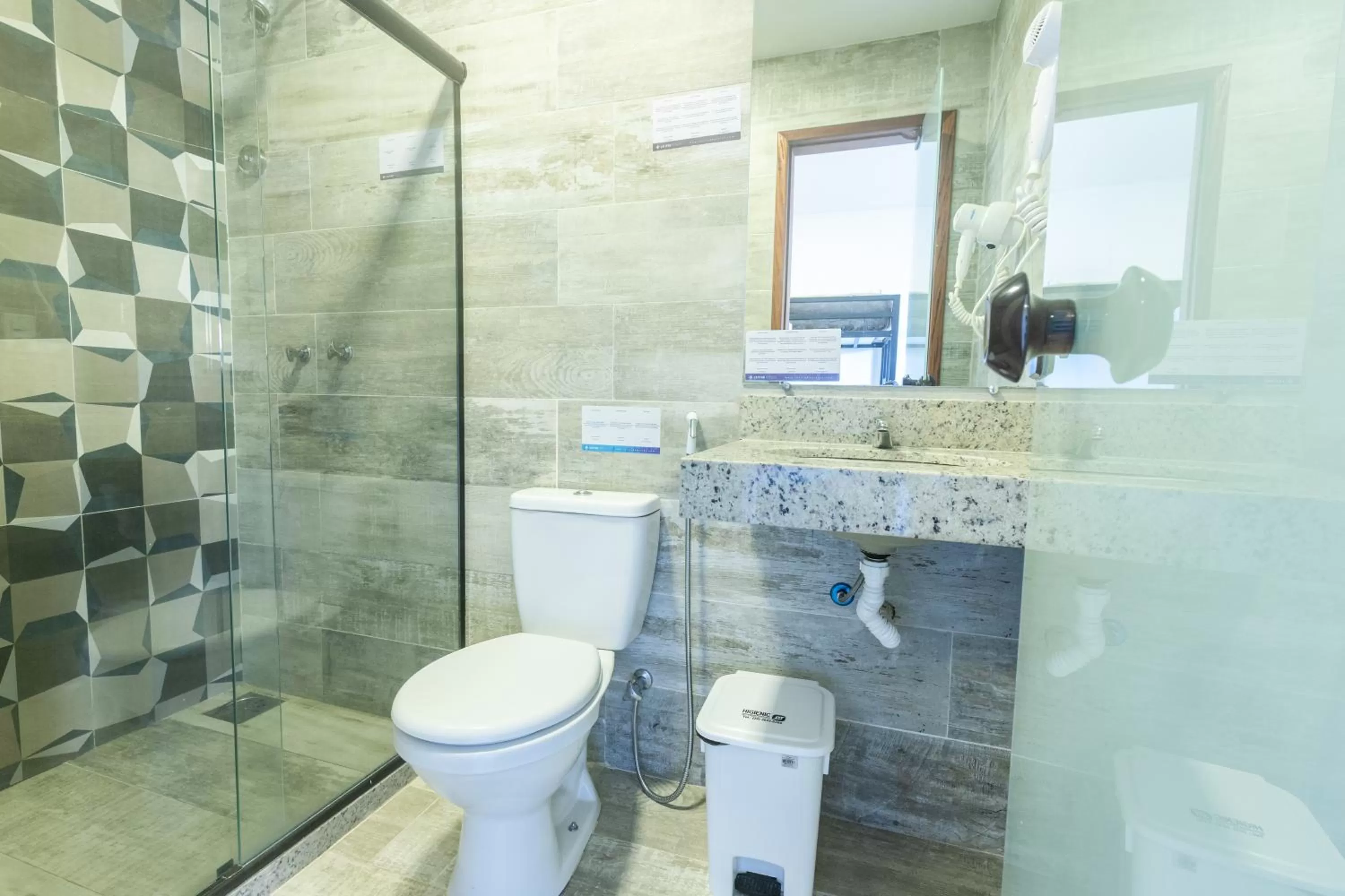 Toilet in Hotel Barra da Lagoa by Latitud Hoteles