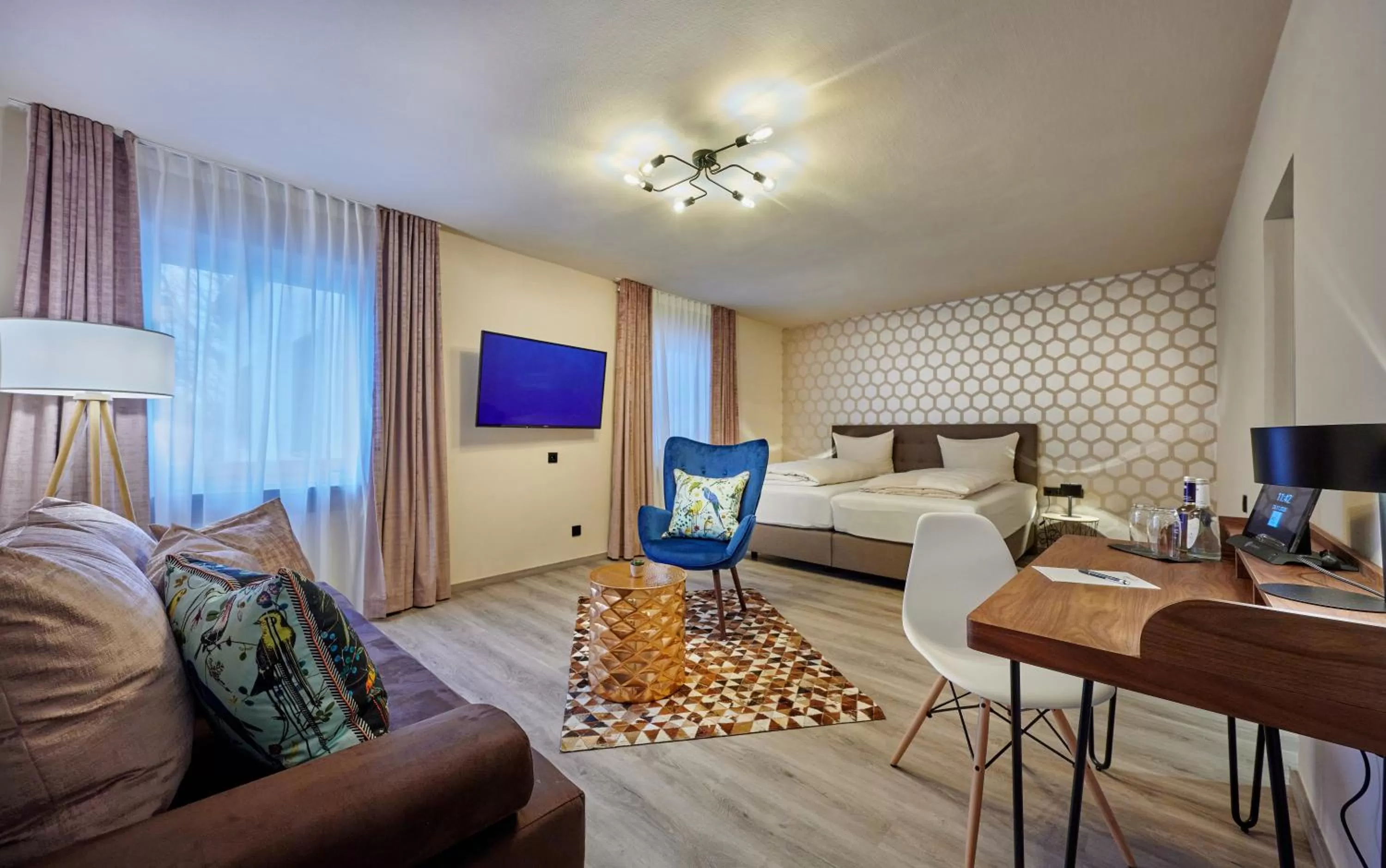 Photo of the whole room, Bed in Genusshotel Wenisch