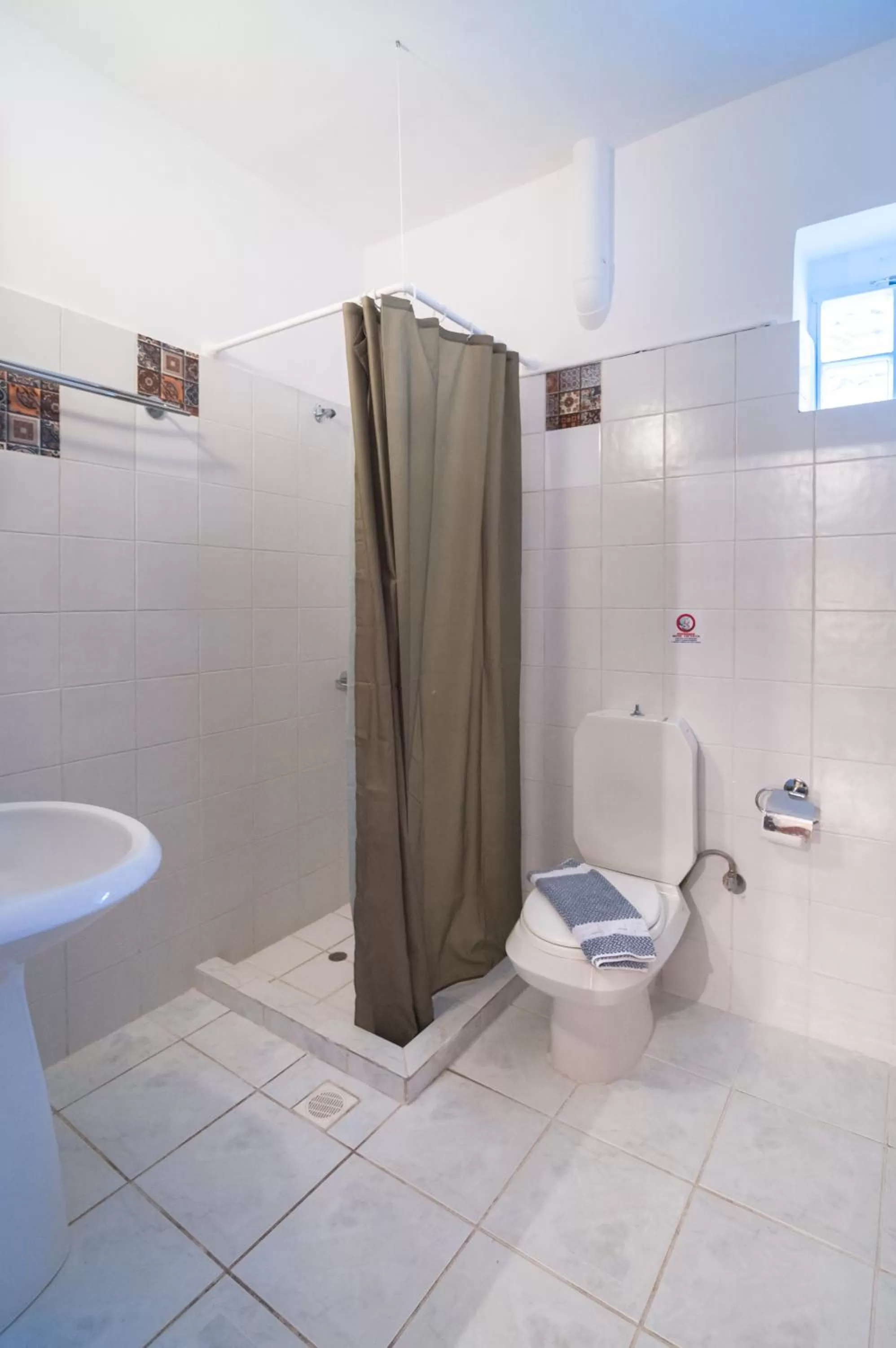 Shower in Poco Loco Bed & Breakfast