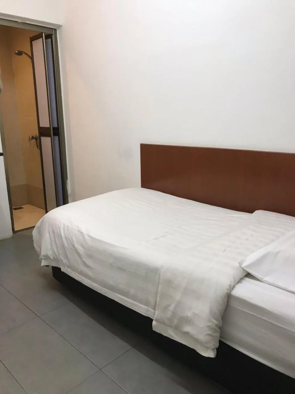 Bed in Ming Paragon Hotel