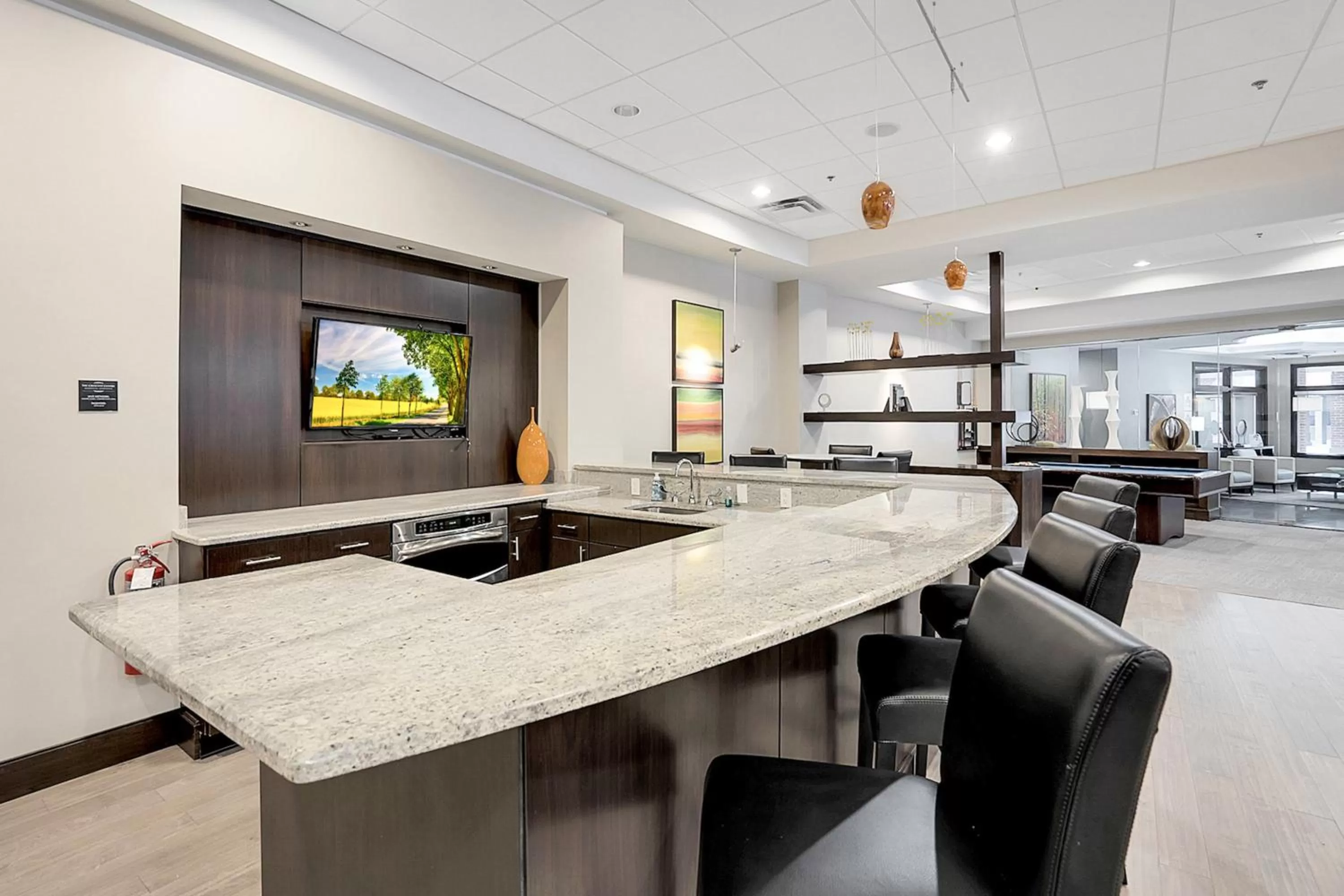 Communal lounge/ TV room in Kasa Downtown Louisville