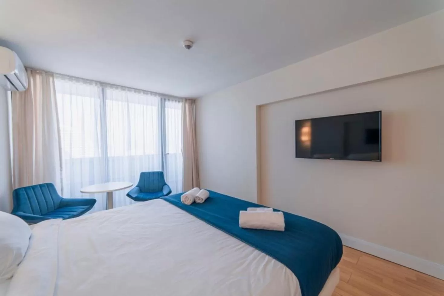 Bed in Orbi City Business Class Aparthotel