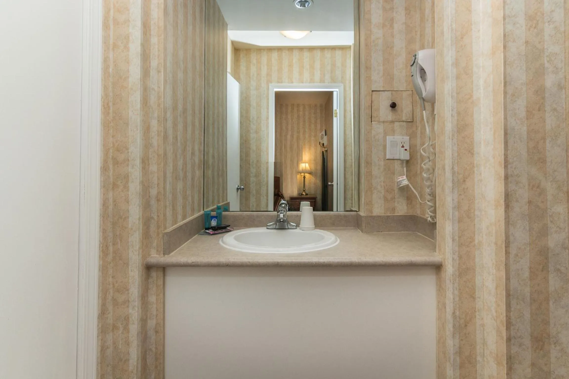 Bathroom in Canadas Best Value Inn Chinook Station