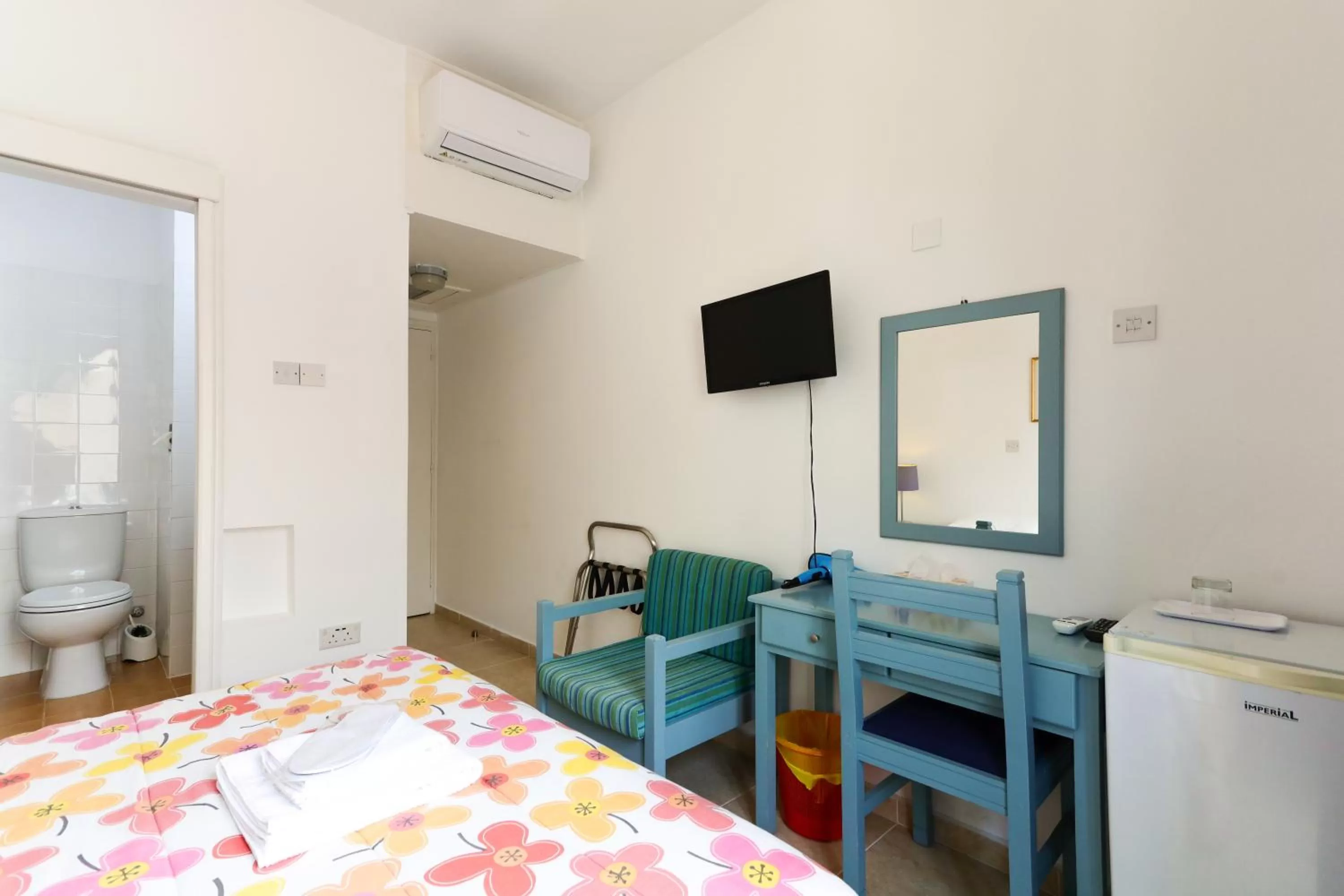 Bed in Axiothea Hotel