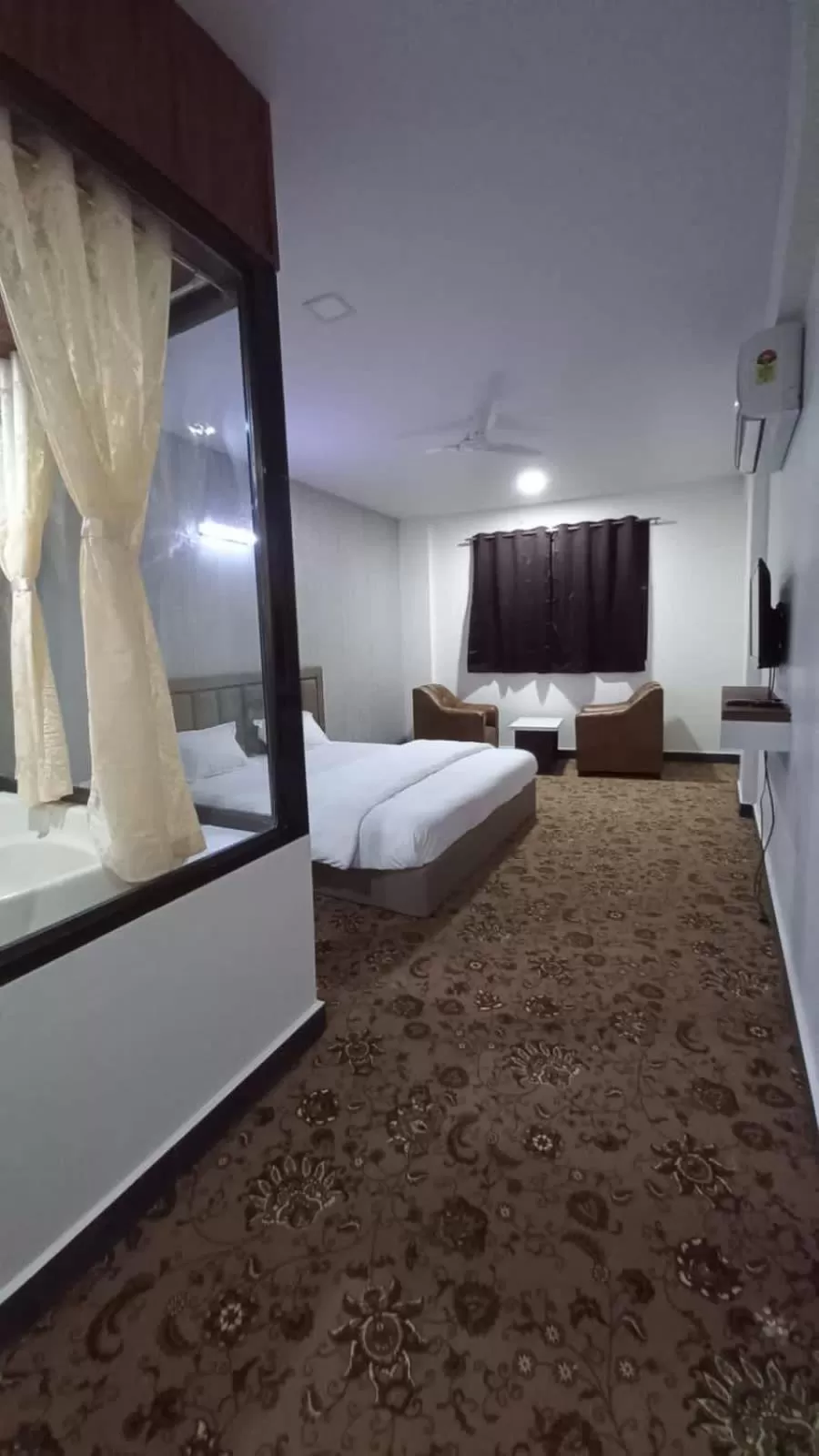 Bed in Hotel Jurkis, Kolhapur