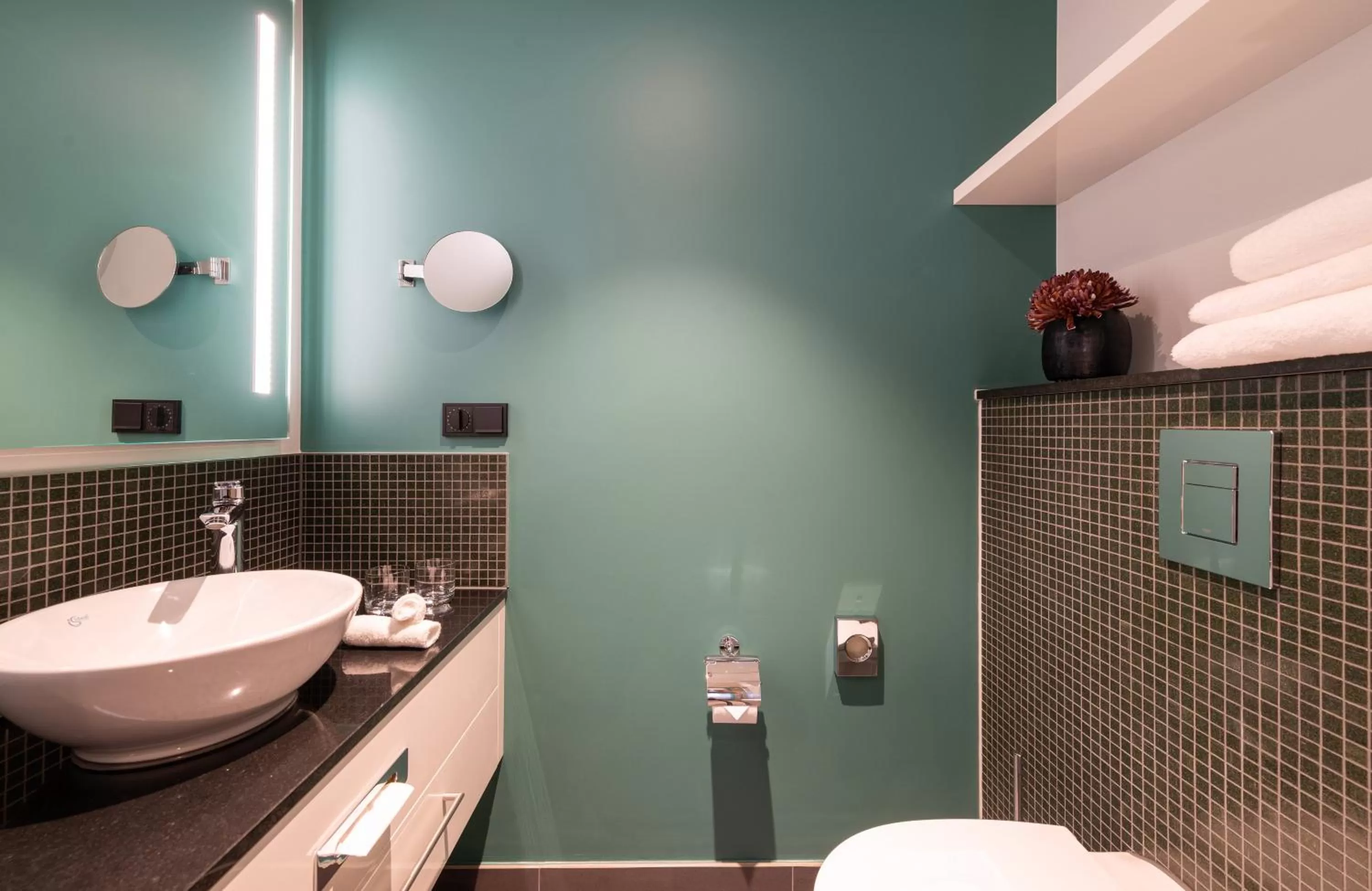 Bathroom in Leonardo Hotel Augsburg