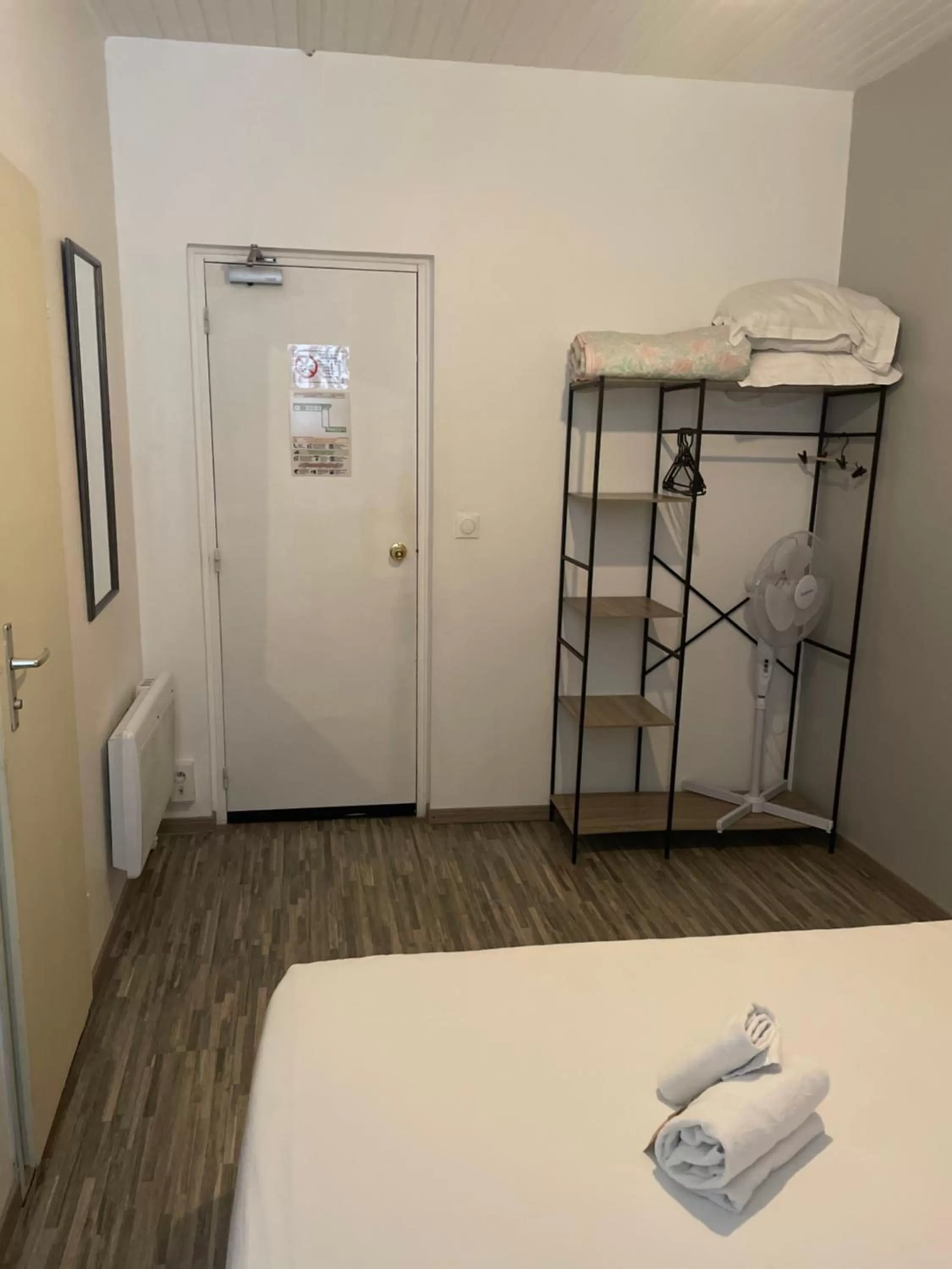 wardrobe, Bed in Hôtel & Restaurant Le Patio VICHY