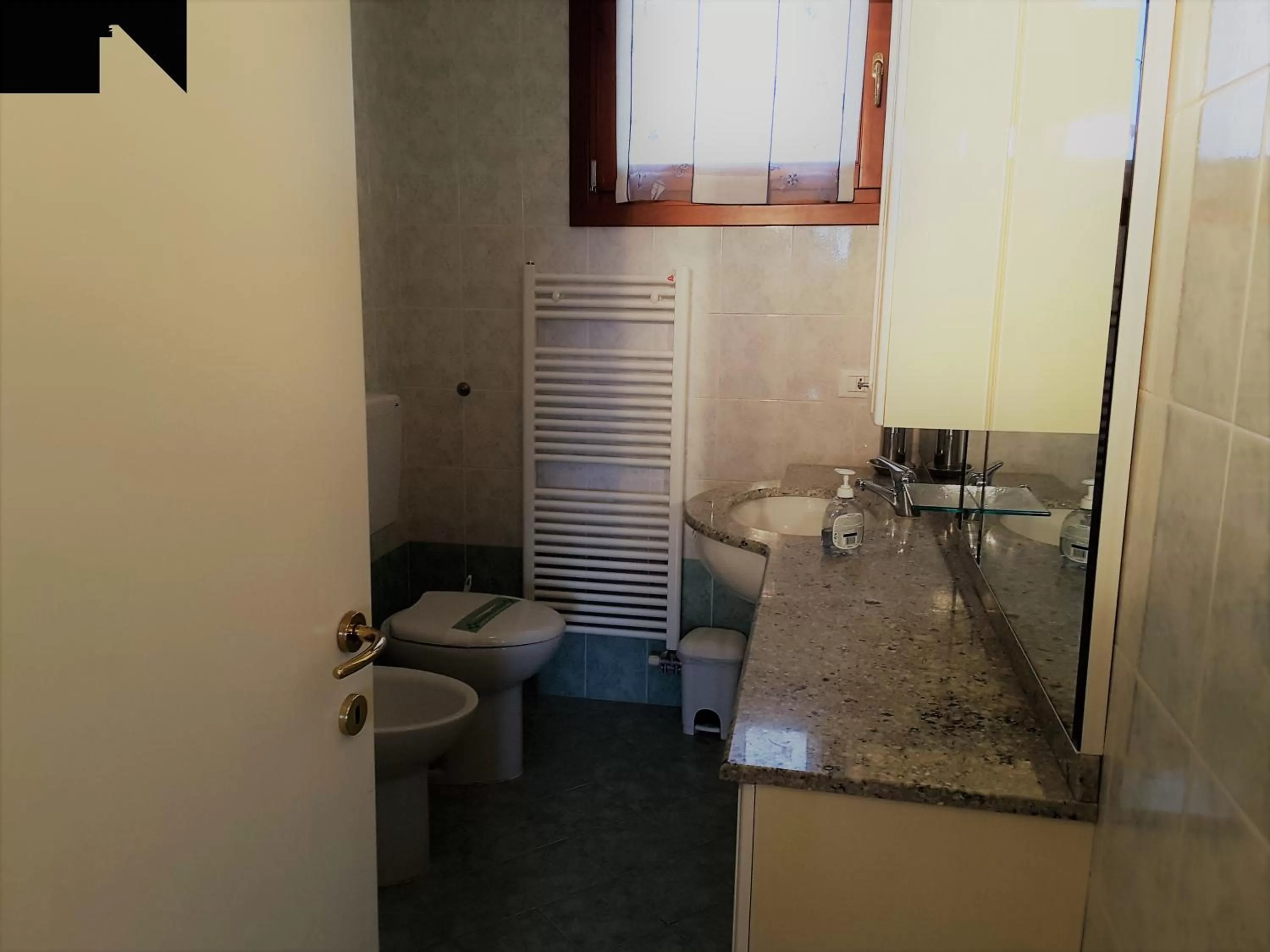 Bathroom in Villaggio dei Fiori Apart- Hotel 3 Stars - Family Resort