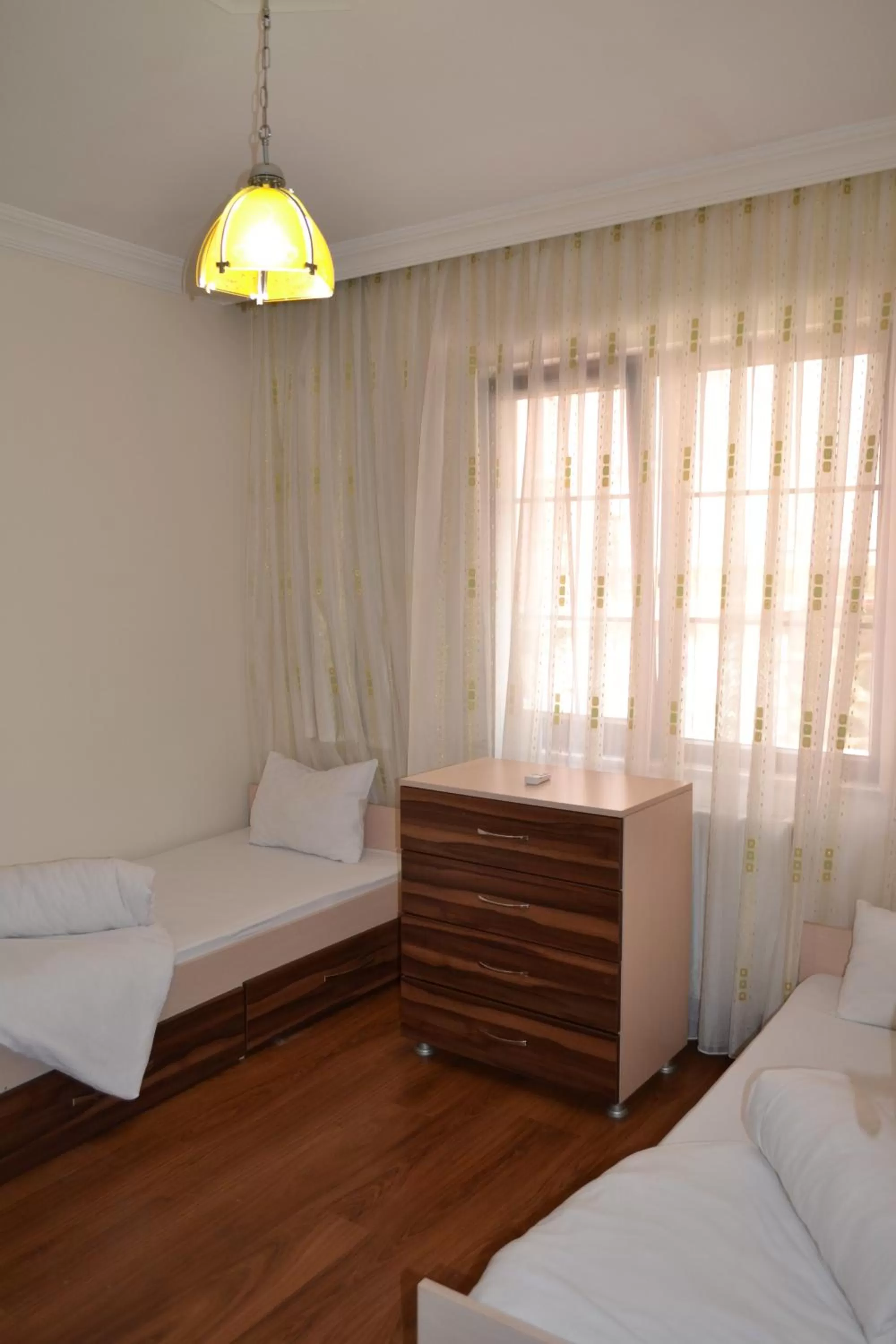 Bed, Seating Area in The Twins Apartmens