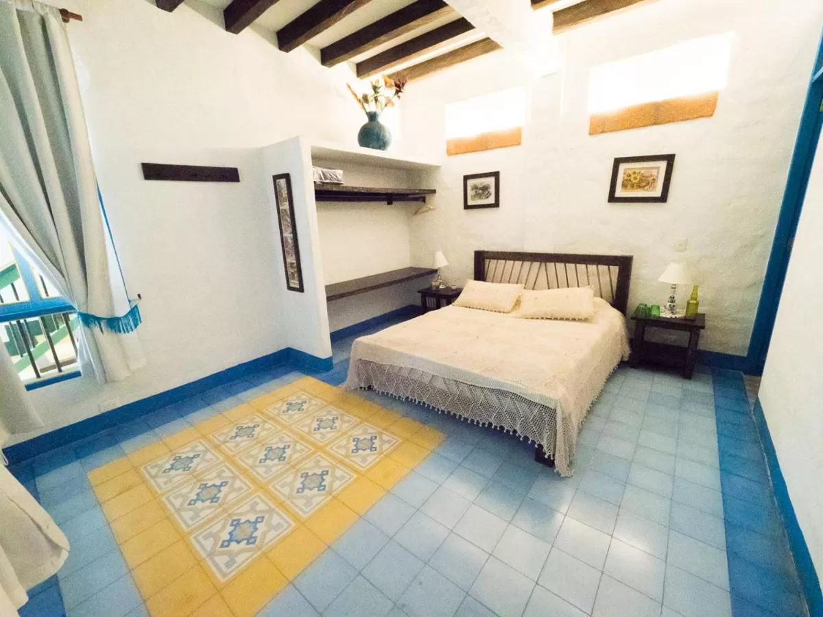 Bed in El Despertar Hotel