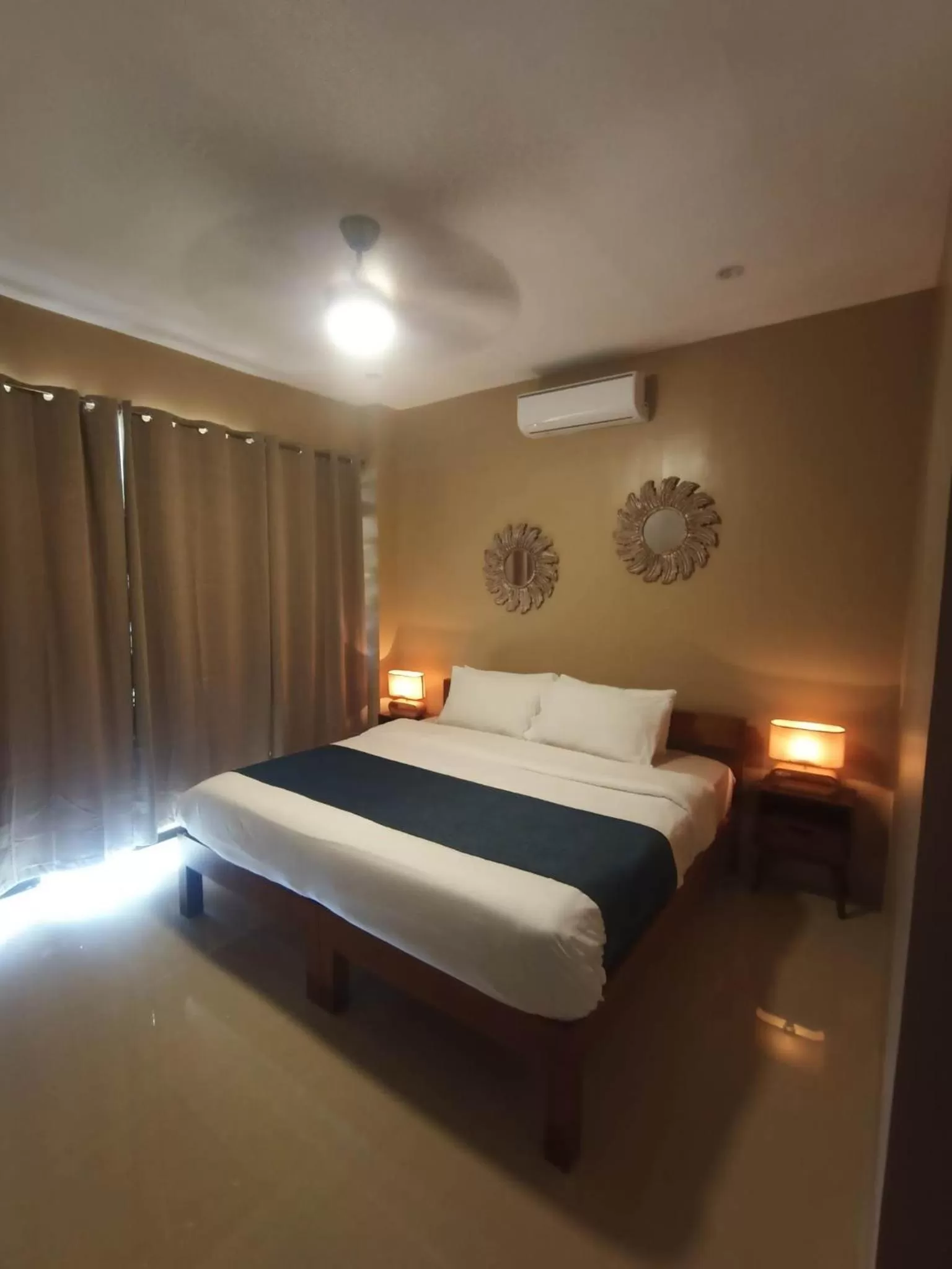 Bedroom, Bed in Southseas Beach Resort and Dive Center