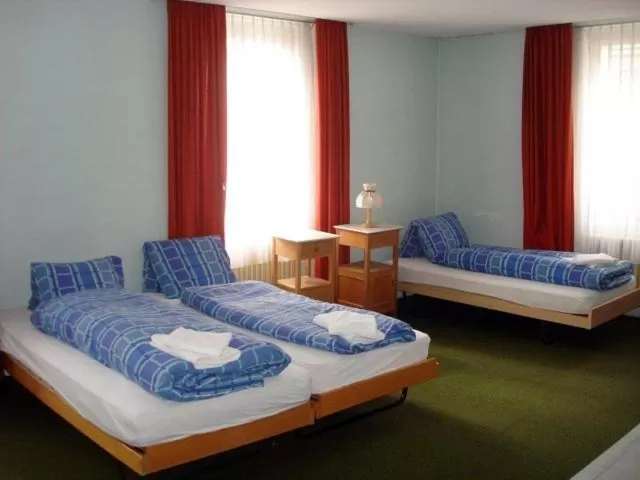 Bed in Hotel Quellenhof