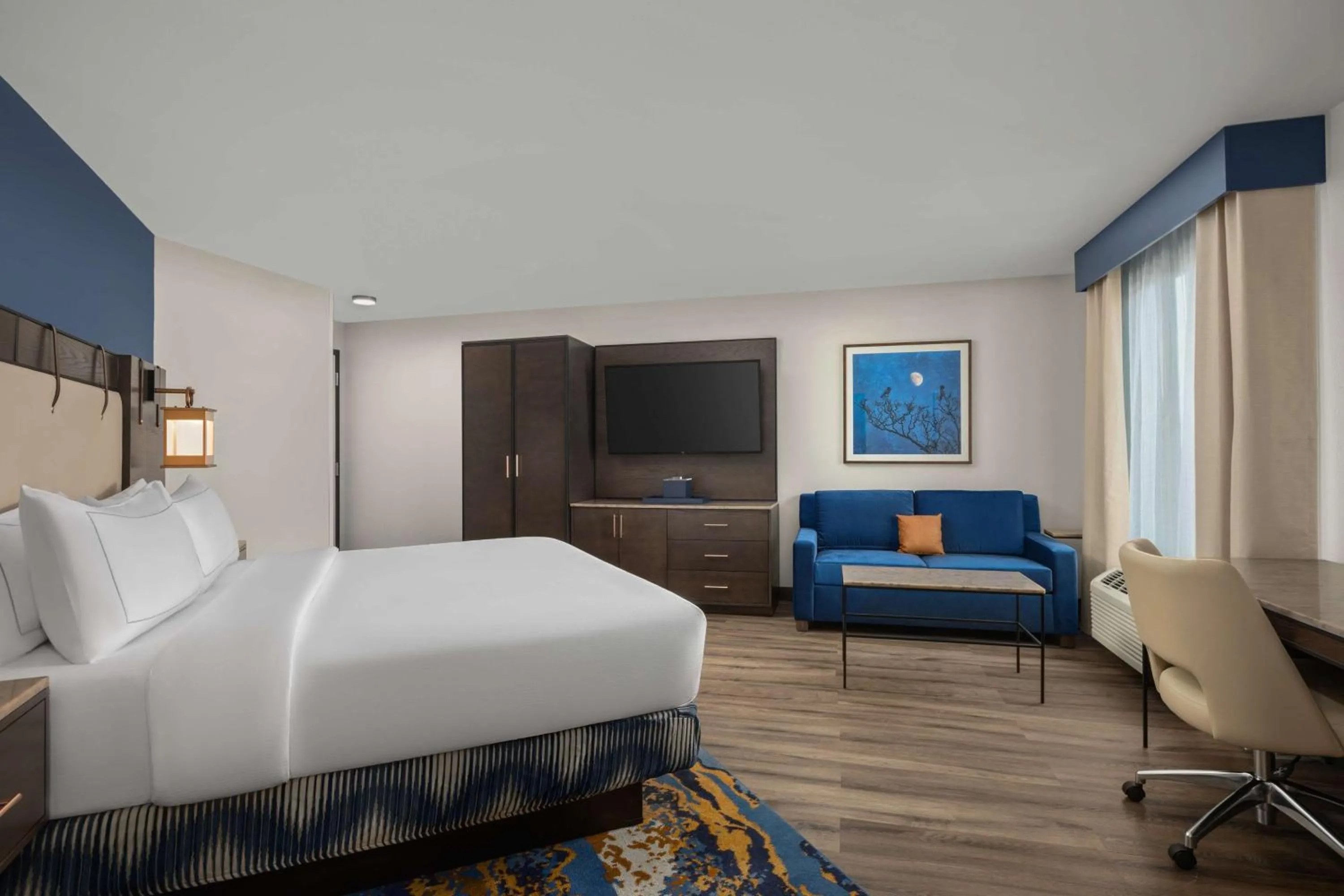 Living room, Bed in Hotel Westport Kansas City, Tapestry Collection by Hilton