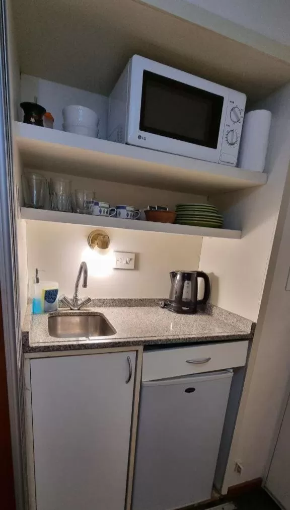 Kitchen or kitchenette in Dg Apart Obelisco