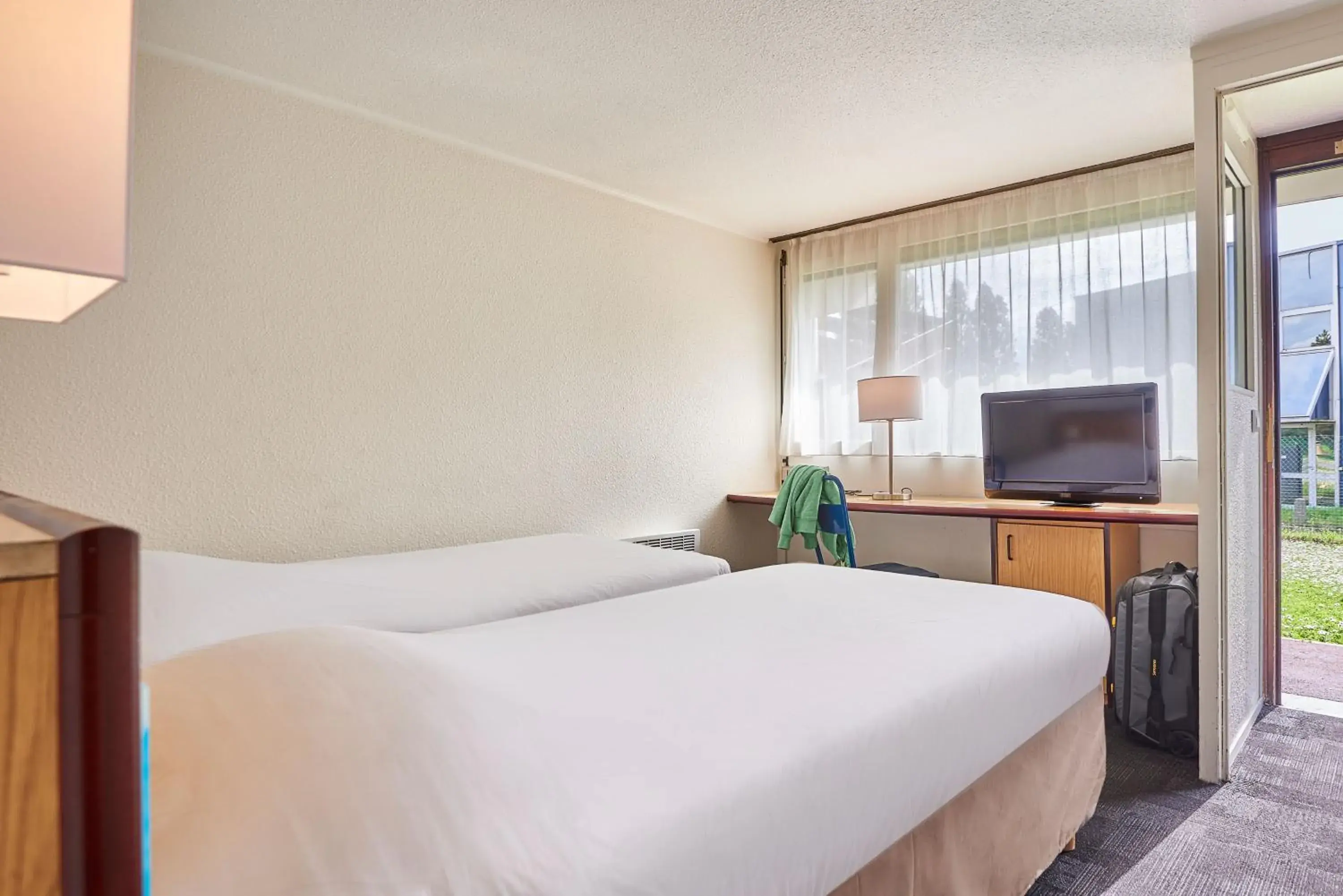 Twin Room with Double Sofa Bed in Kyriad Direct Le Bourget Gonesse Twin Room with Double Sofa Bed in Kyriad Direct Le Bourget Gonesse