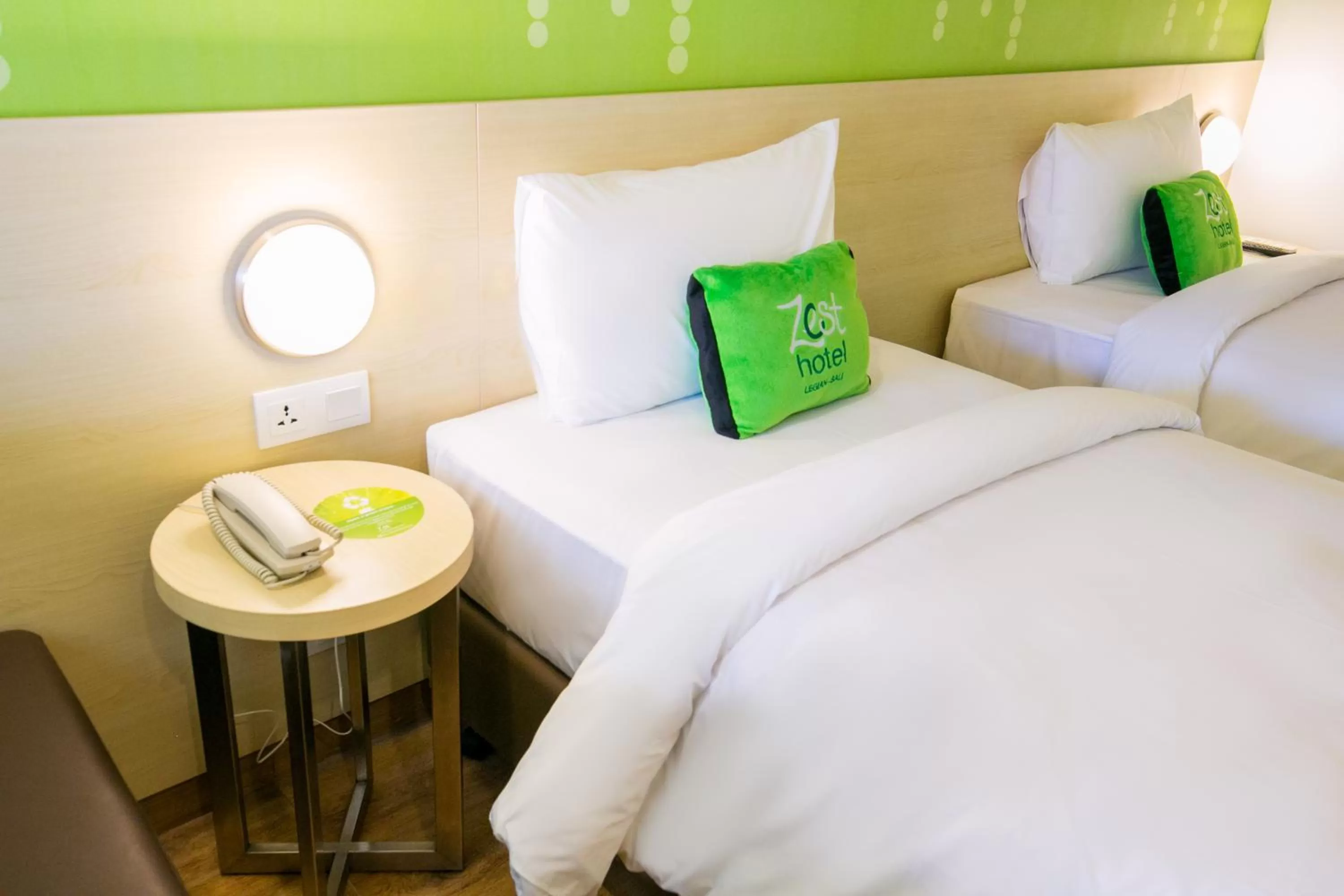 Bed in Zest Legian by Swiss-Belhotel International