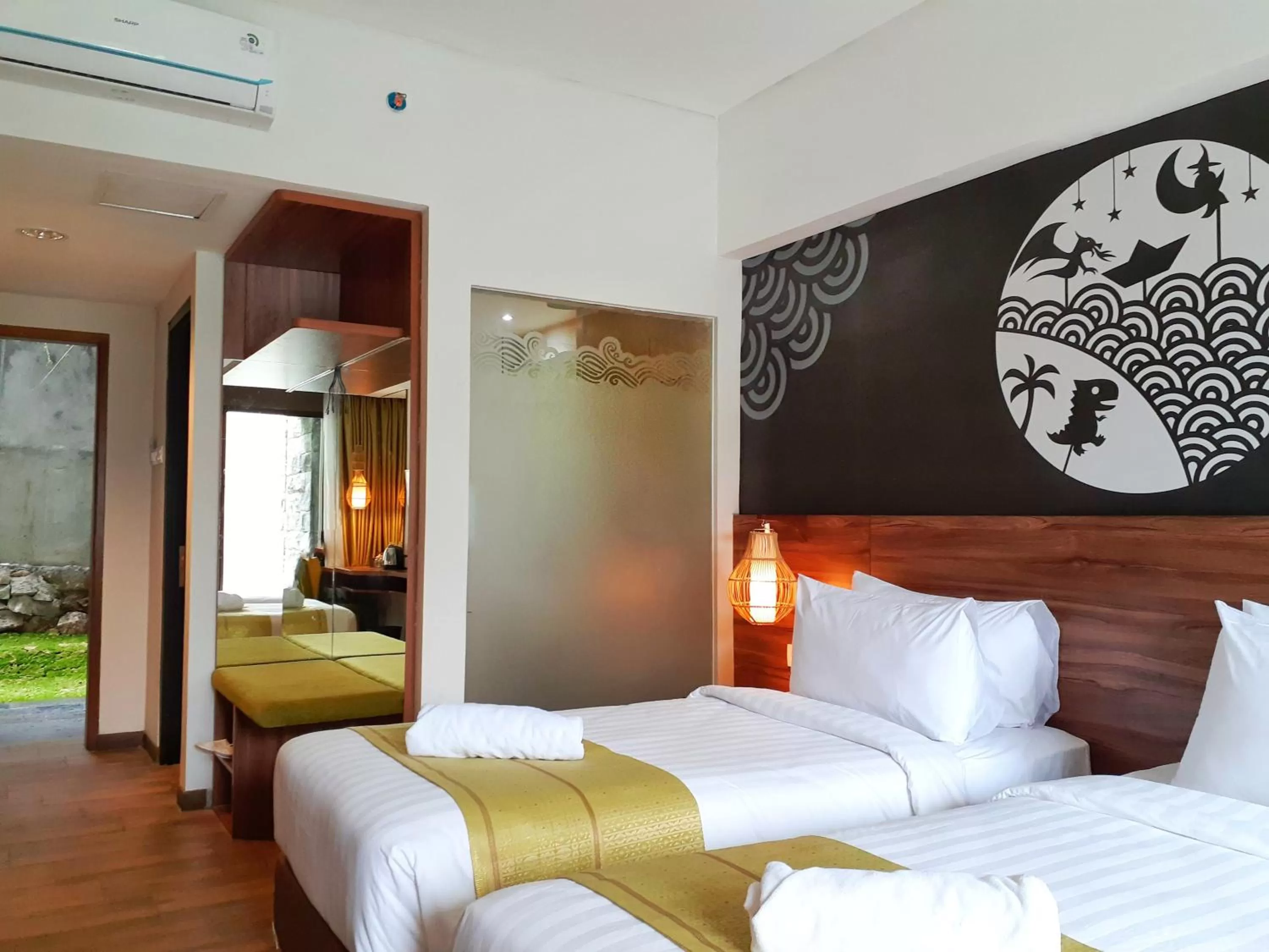 Bed in The Batu Hotel & Villas