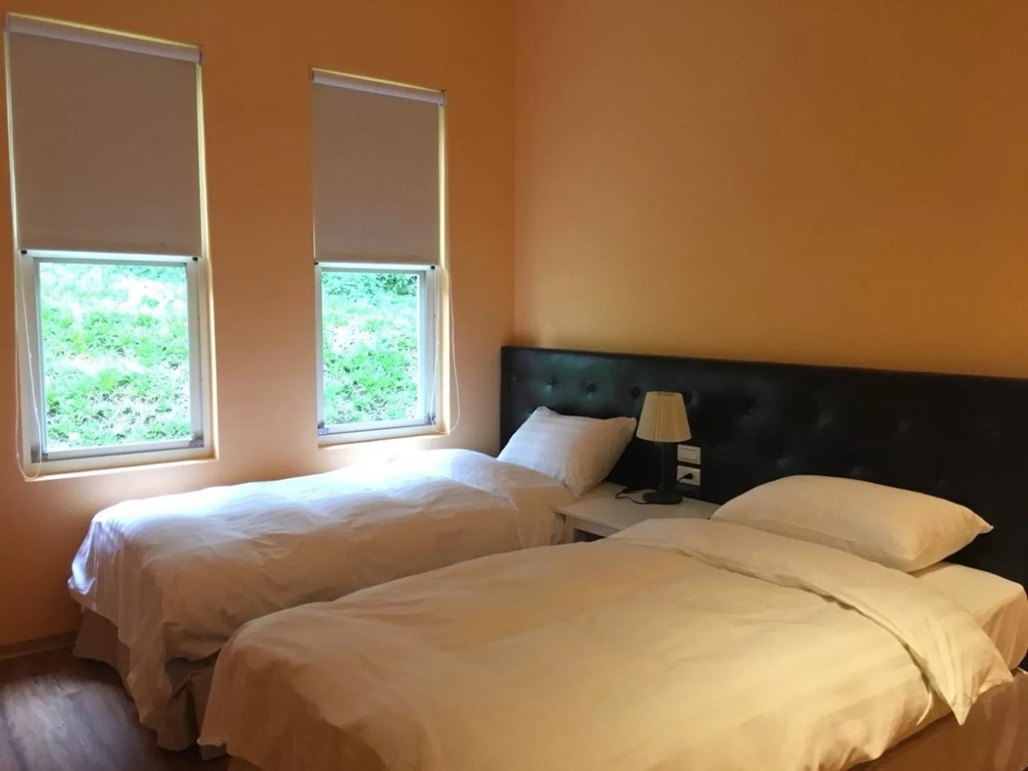 Bed in American Village Resort