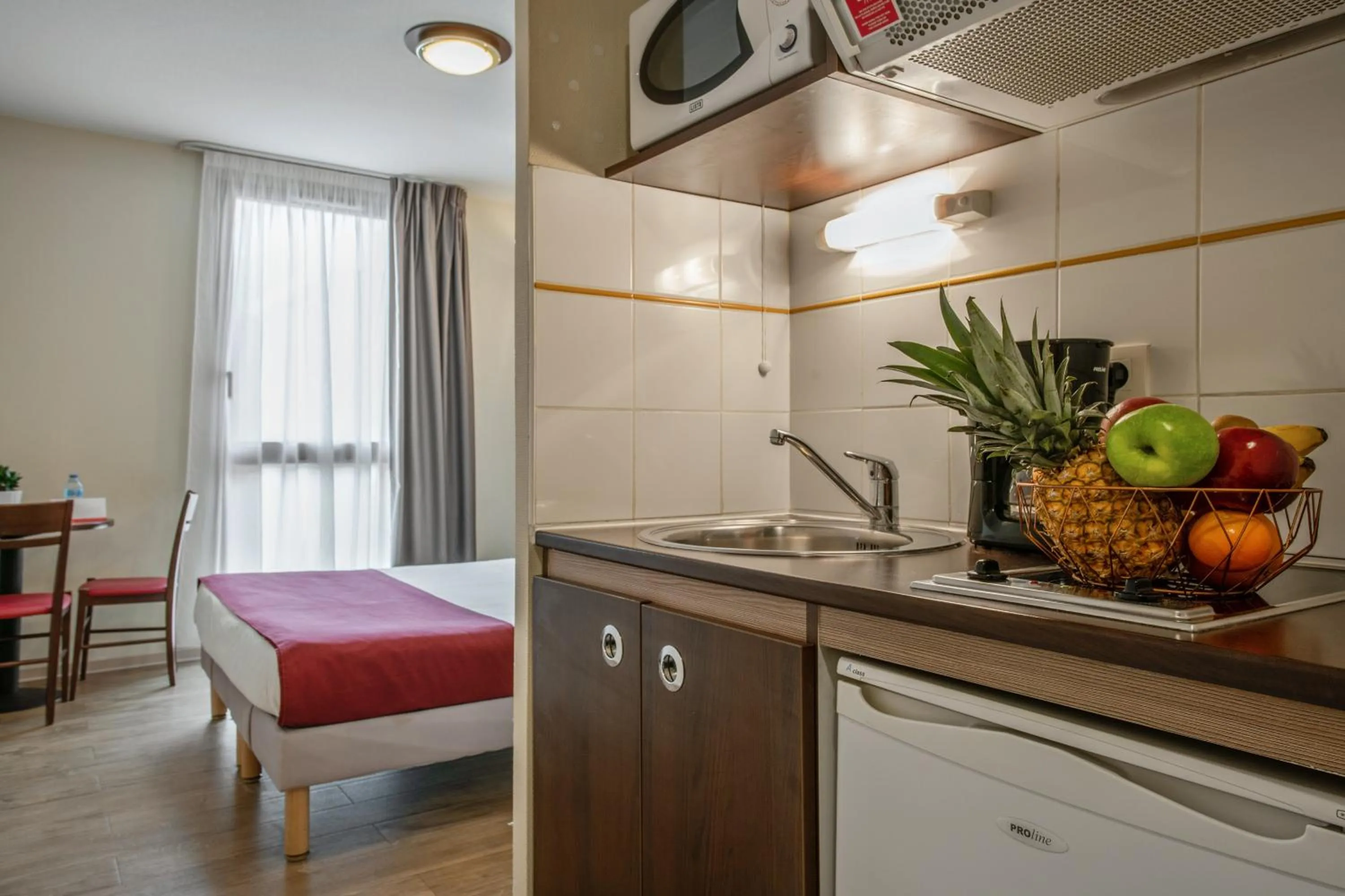 Kitchen or kitchenette in Appart'City Classic Nîmes