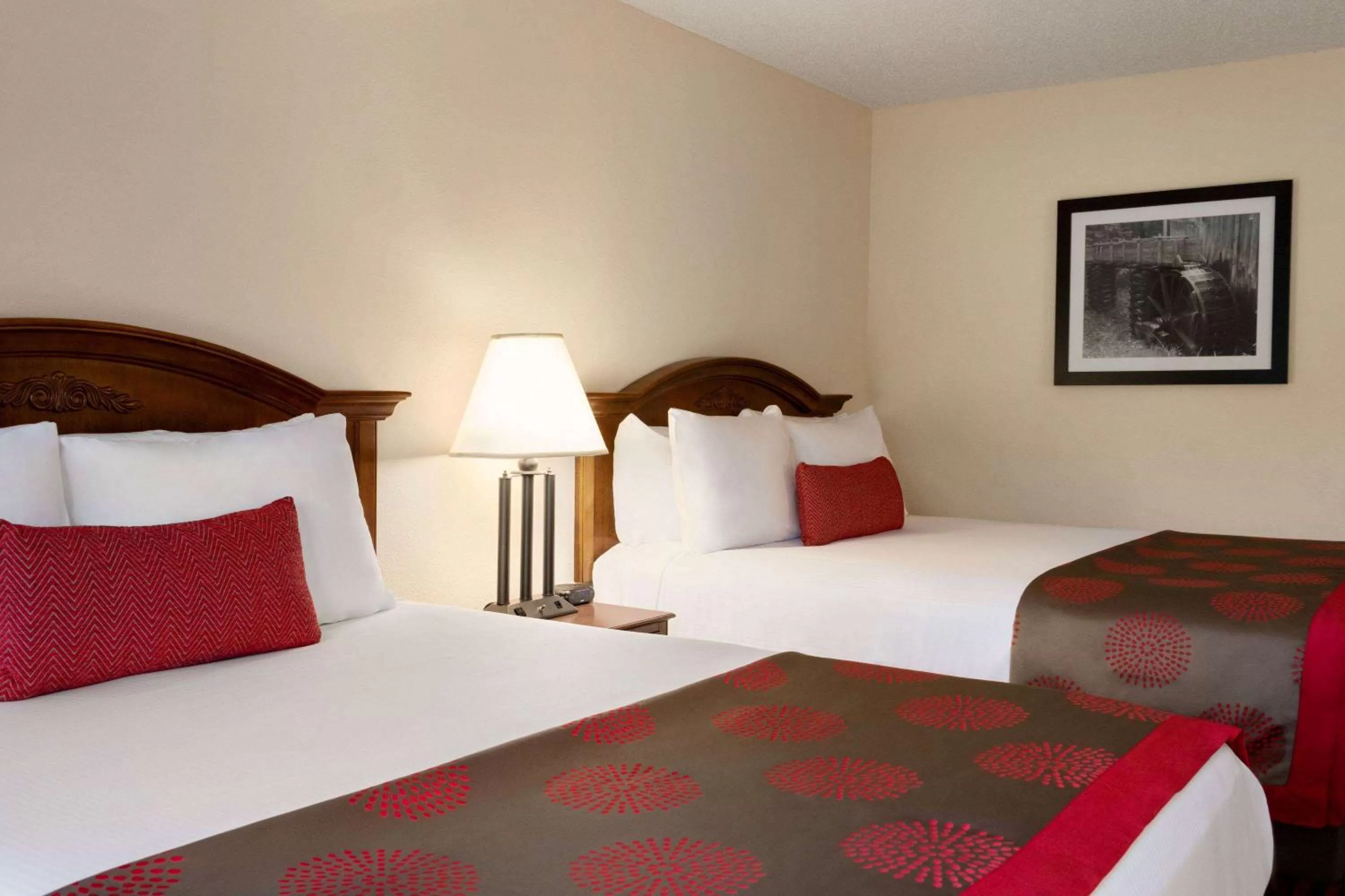 Photo of the whole room, Bed in Ramada by Wyndham Pigeon Forge North