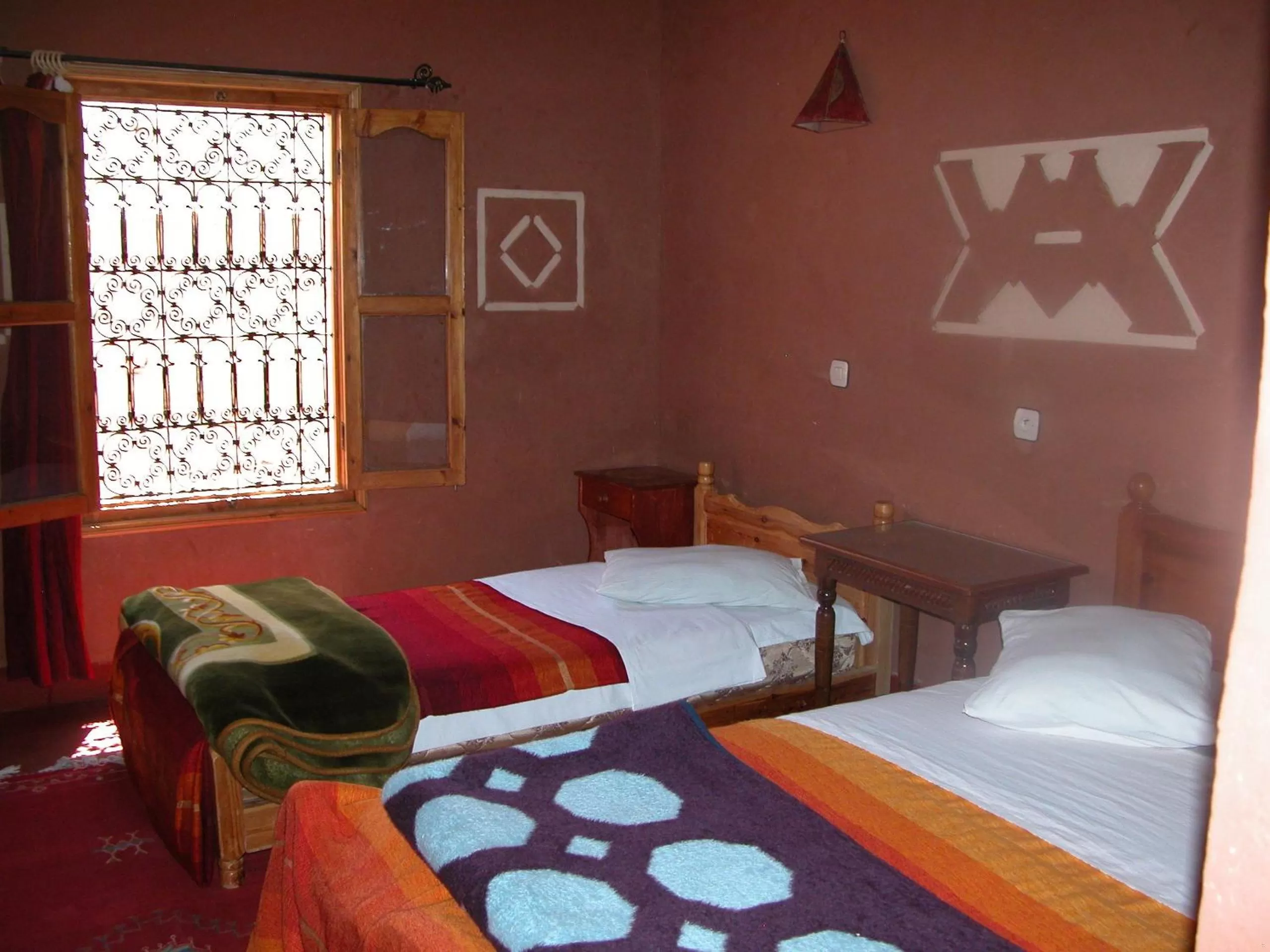 Bed in Maison d'Hôte Valentine