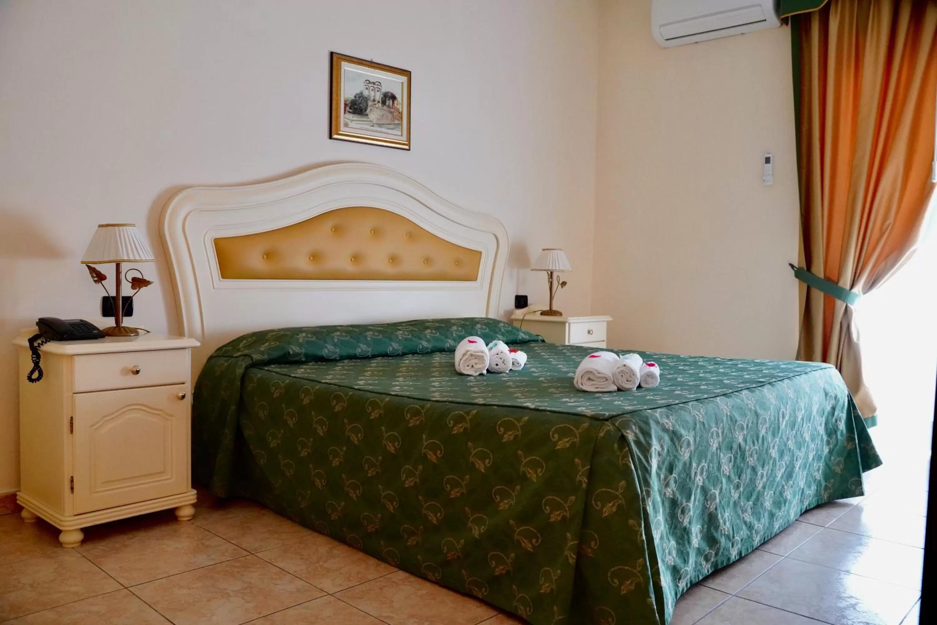 Bedroom in Hotel Roscianum Welness SPA