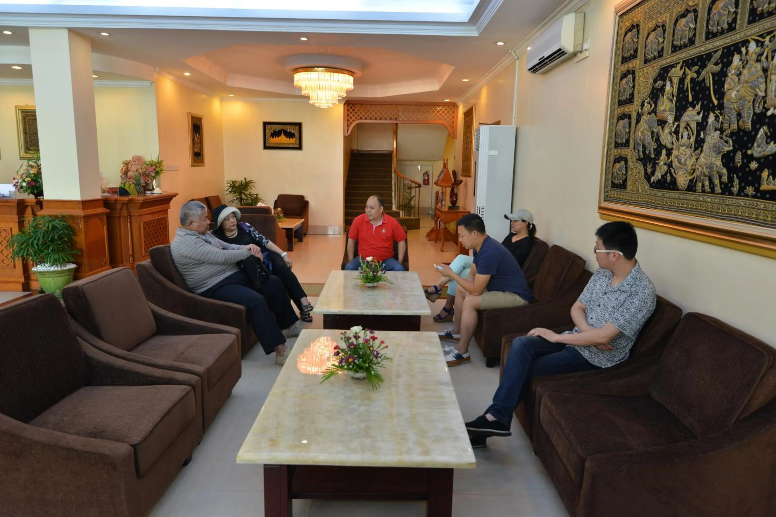 group of guests in Grand Palace Hotel