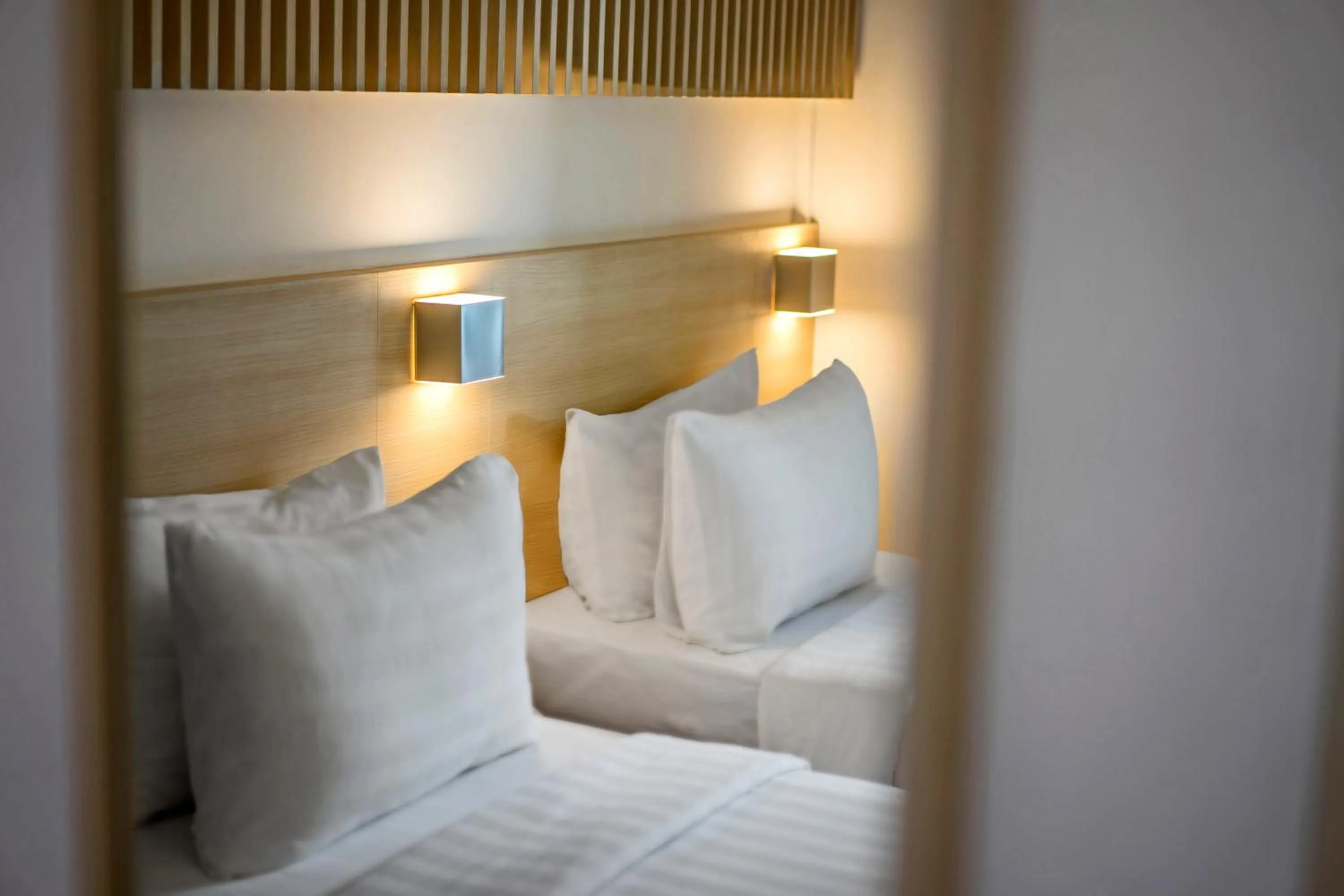 Bed in Malaka Hotel Bandung