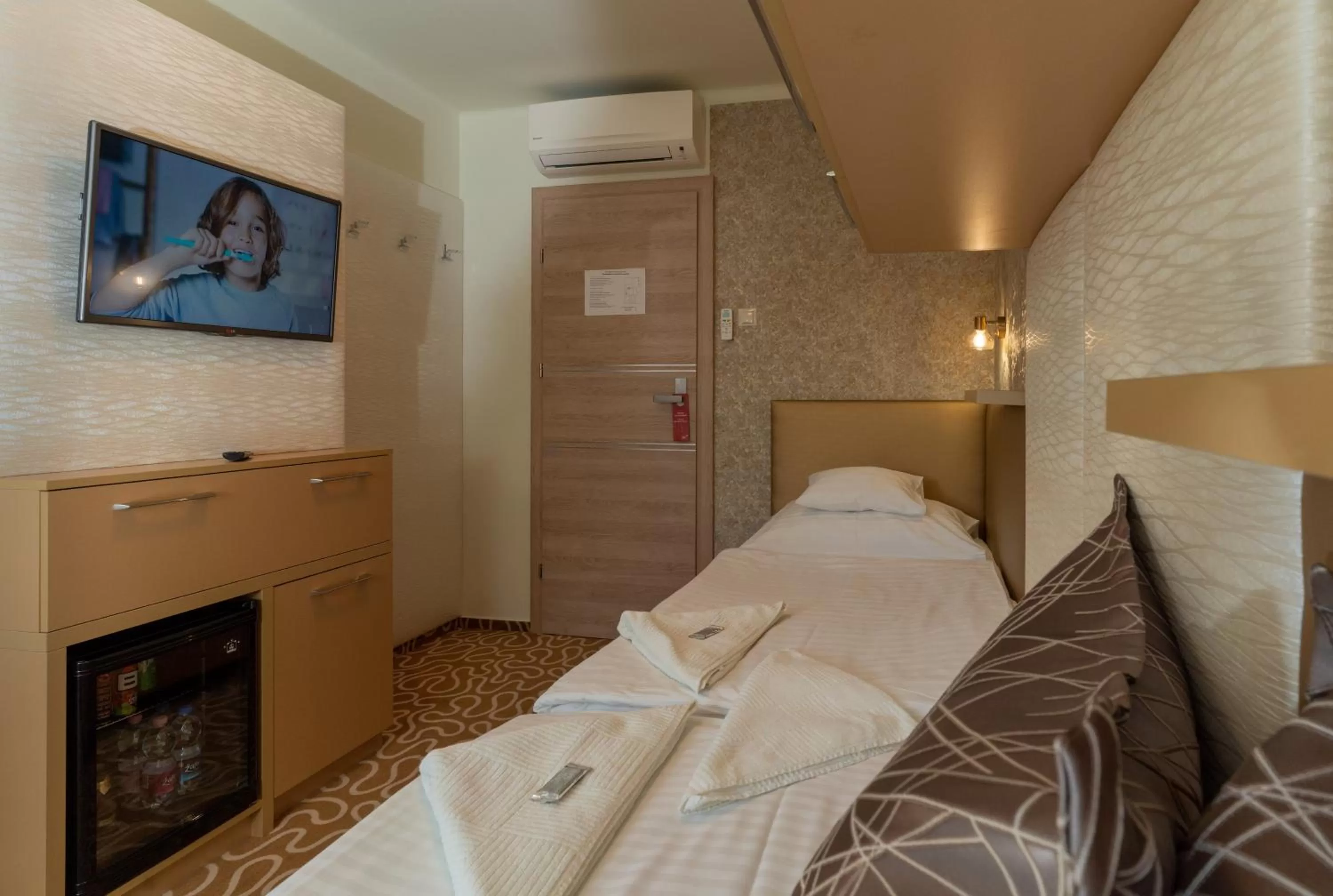 Bed in Teátrum Boutique Hotel