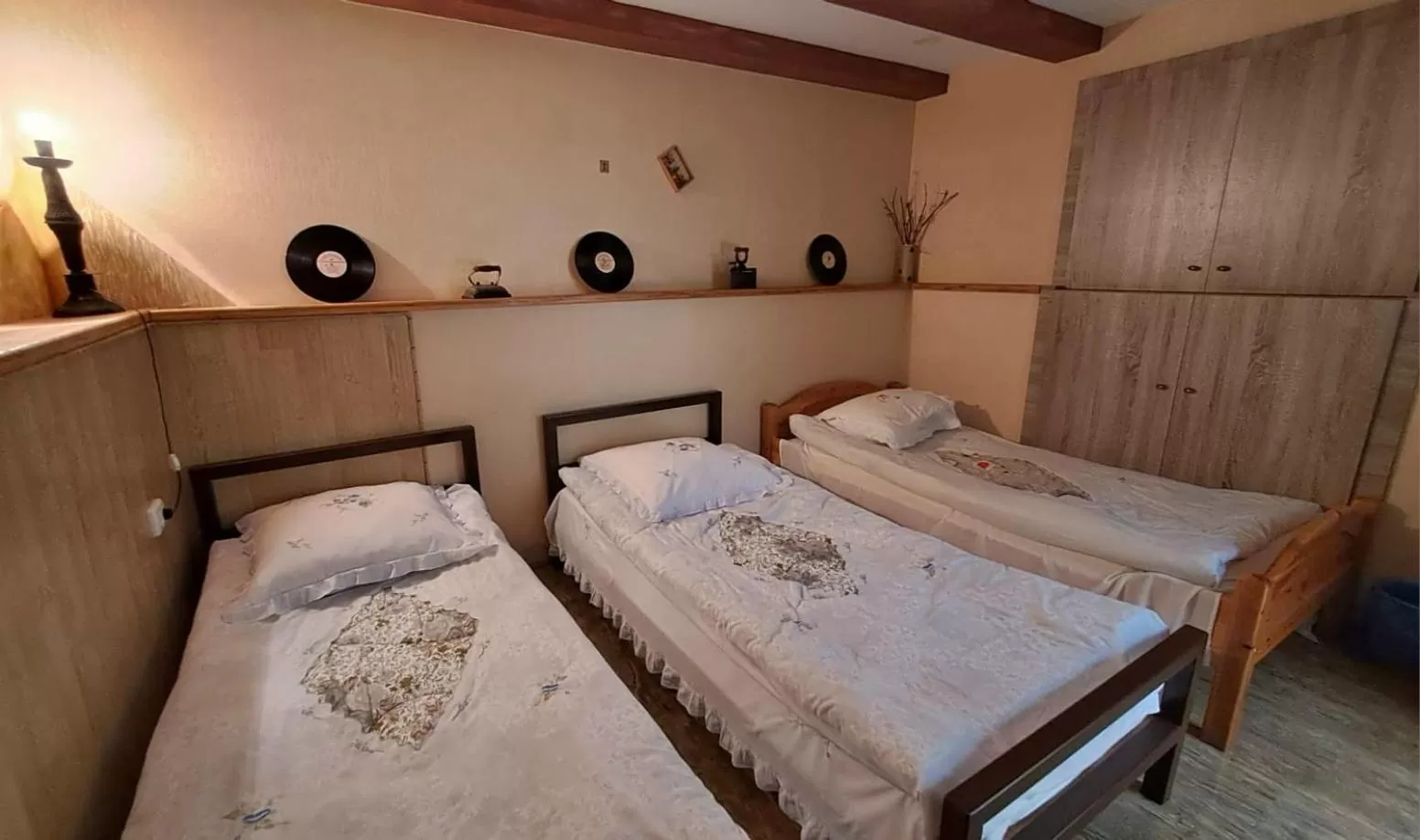 Bed in Qilimcha's Guesthouse