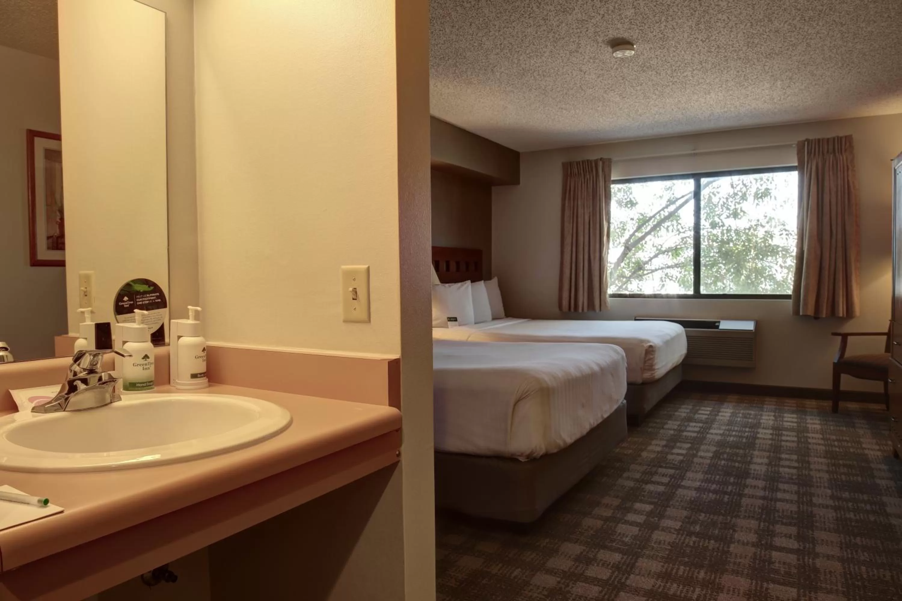 Bathroom, Bed in GreenTree Inn Albuquerque North I-25