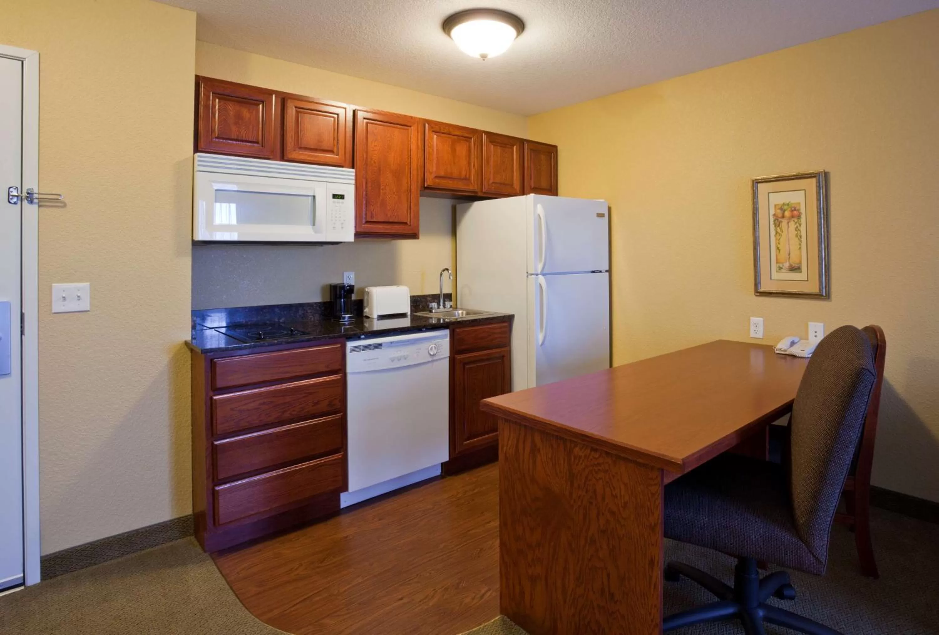 Kitchen or kitchenette in GrandStay Hotel & Suites Ames