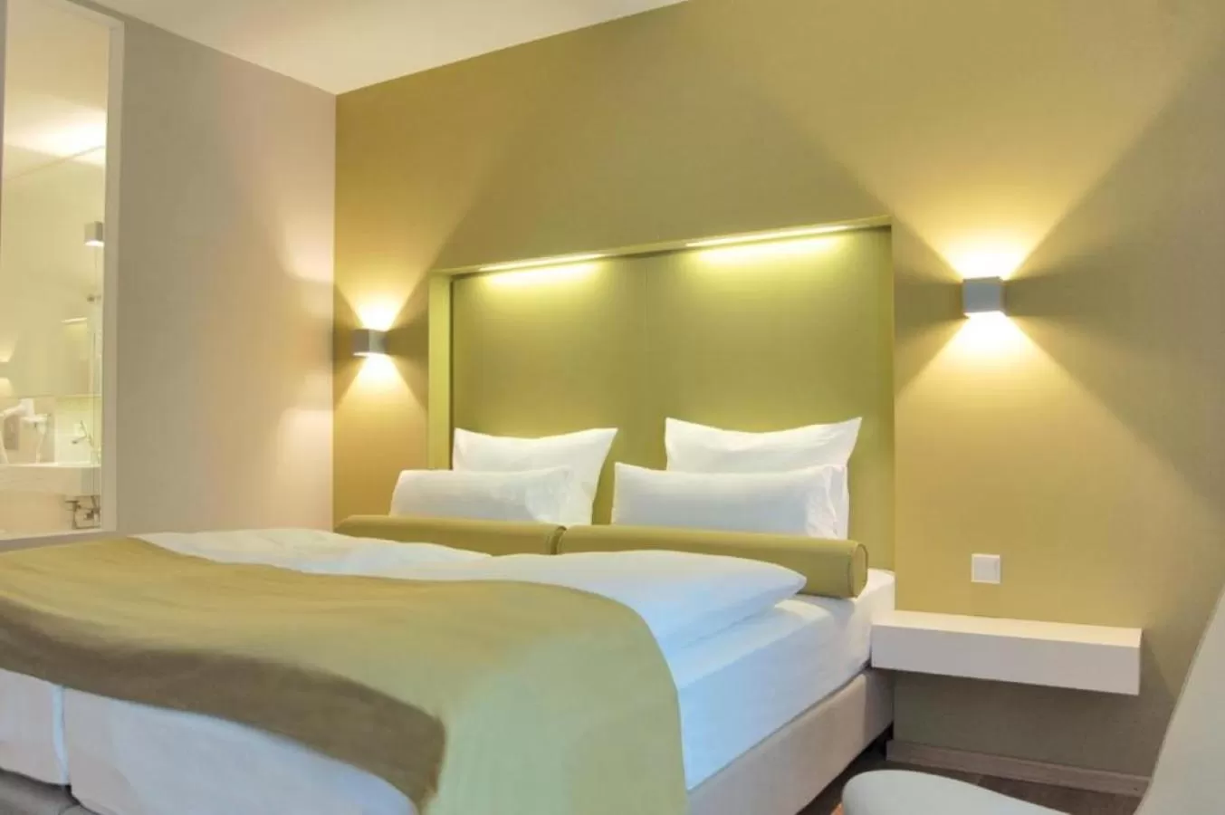 Bed in Nymphe Strandhotel & Apartments