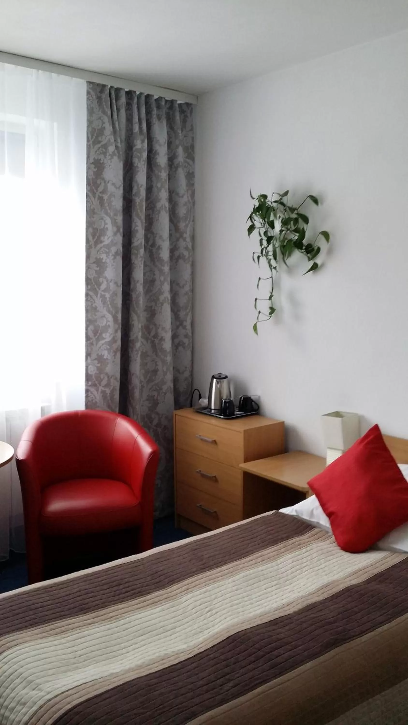 Bed, Seating Area in Hotel As