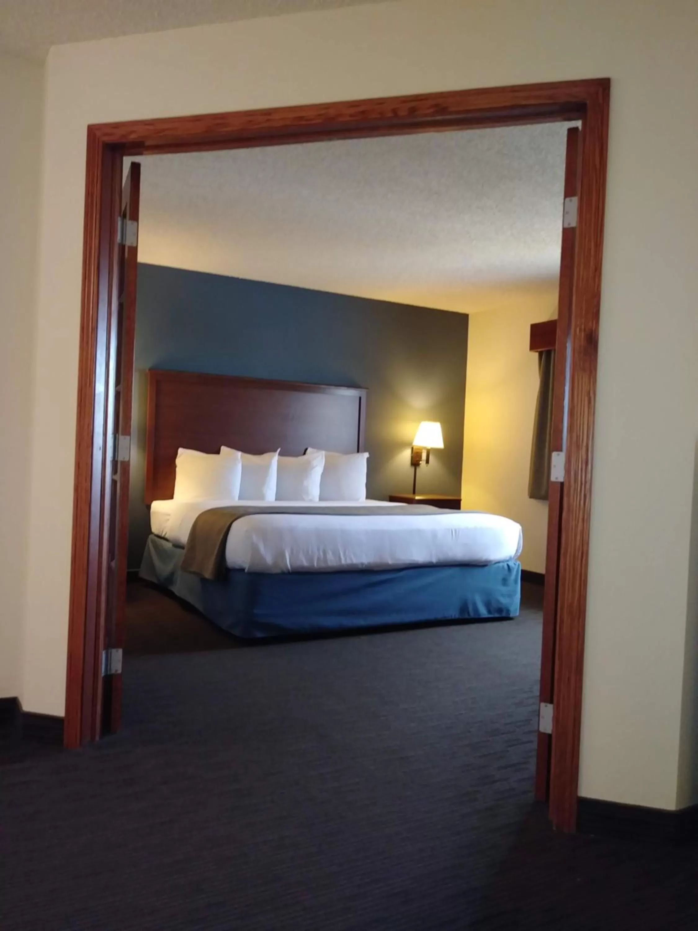 Bed in AmericInn by Wyndham Windsor Ft. Collins