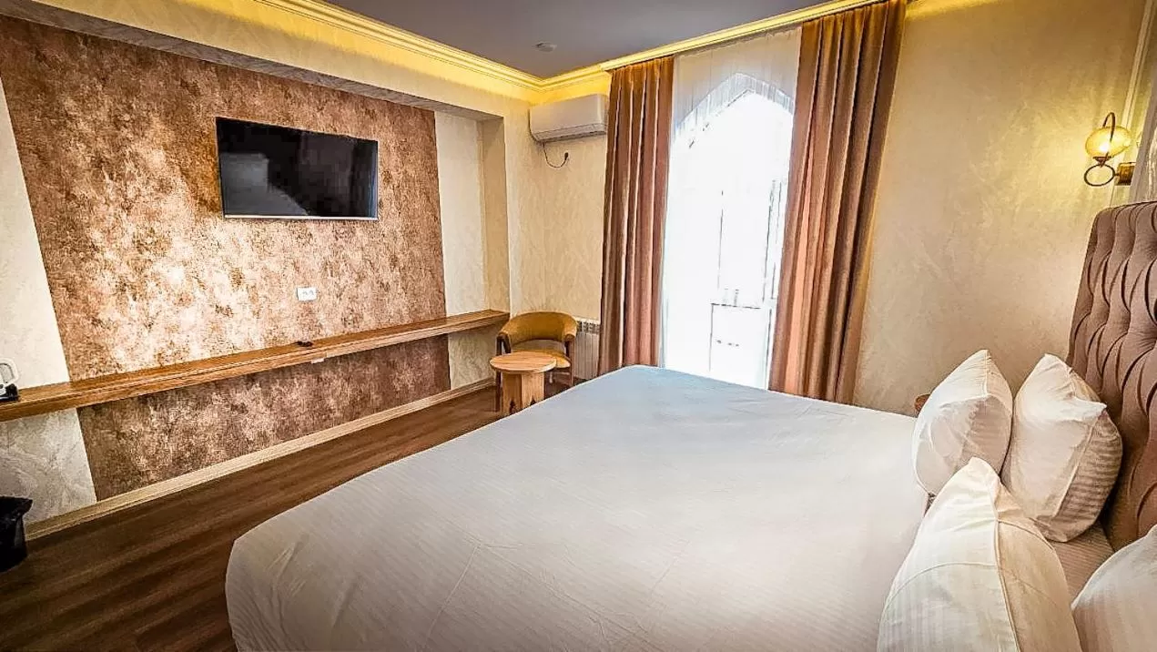 Bed in Hotel Bankir Khiva