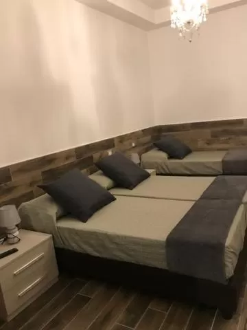 Bed in B&B Fiera Maglo'