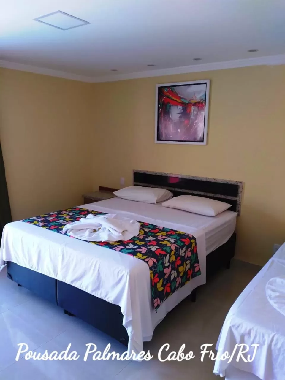 Bed in Pousada Palmares