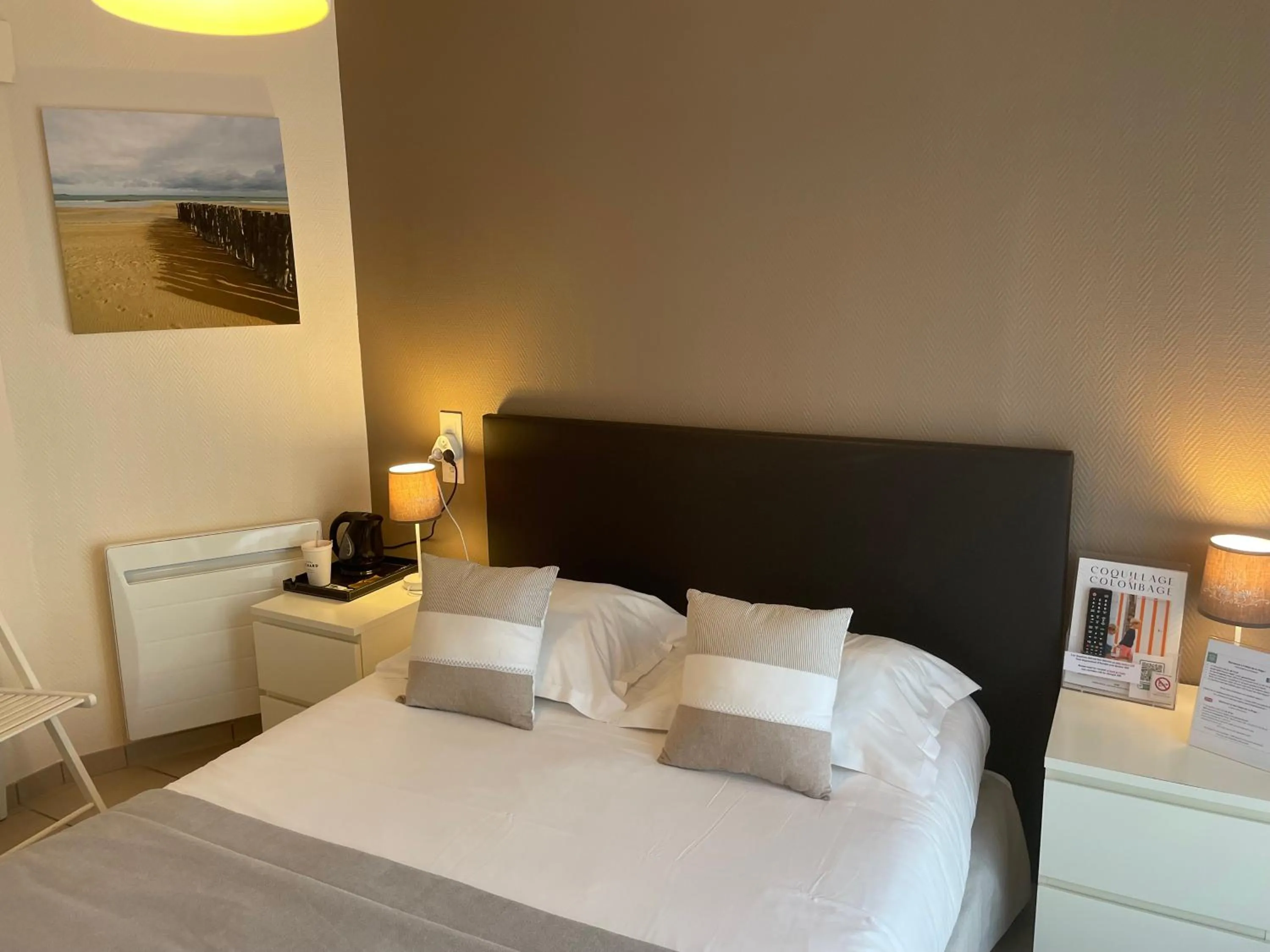 Photo of the whole room, Bed in Hôtel de la Plage