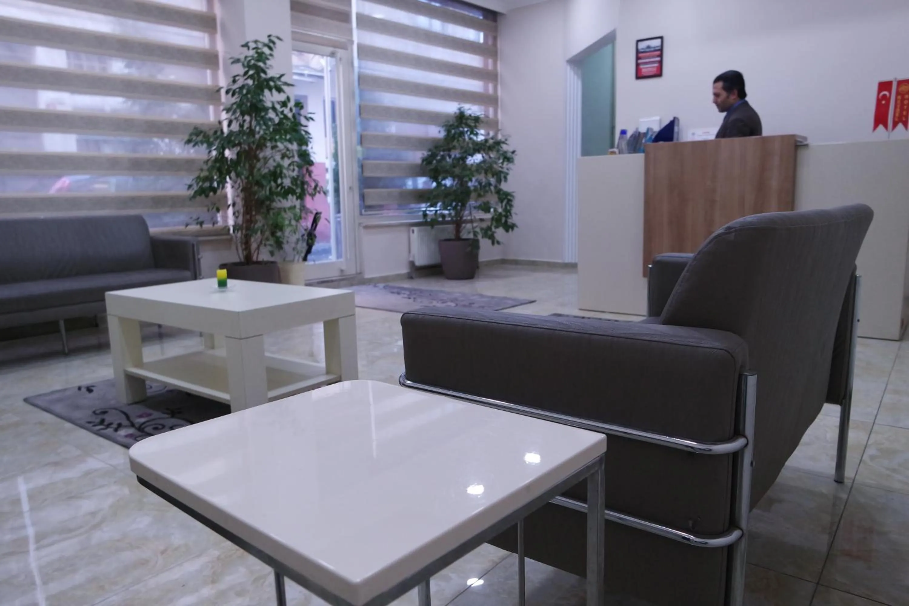 Communal lounge/ TV room in Reydel Hotel