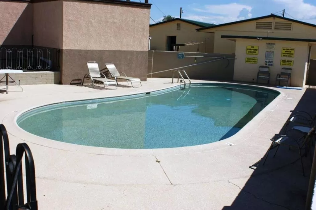 Swimming pool in HWY Express Inn and Suites