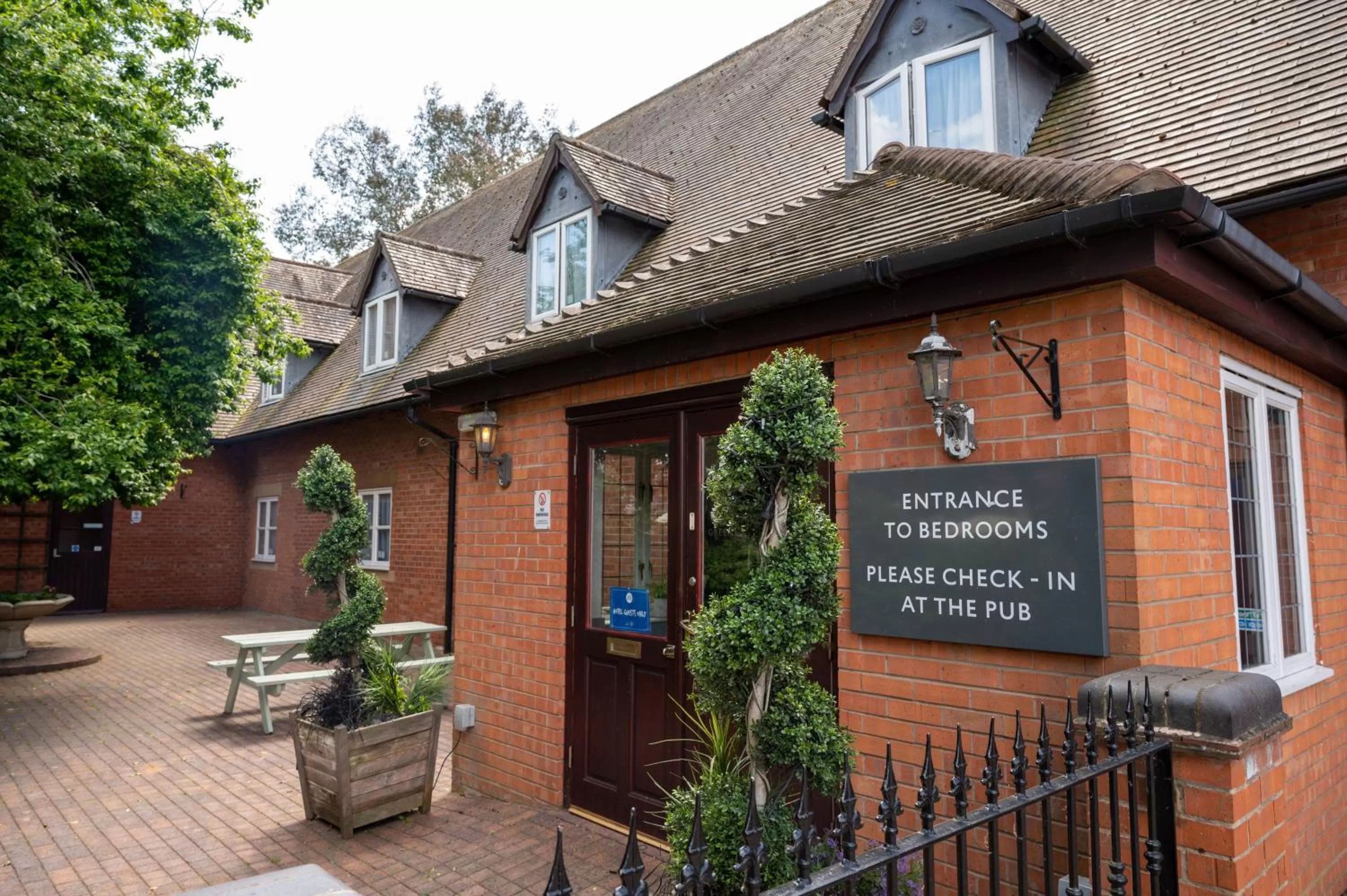Facade/entrance in Cocked Hat by Greene King Inns