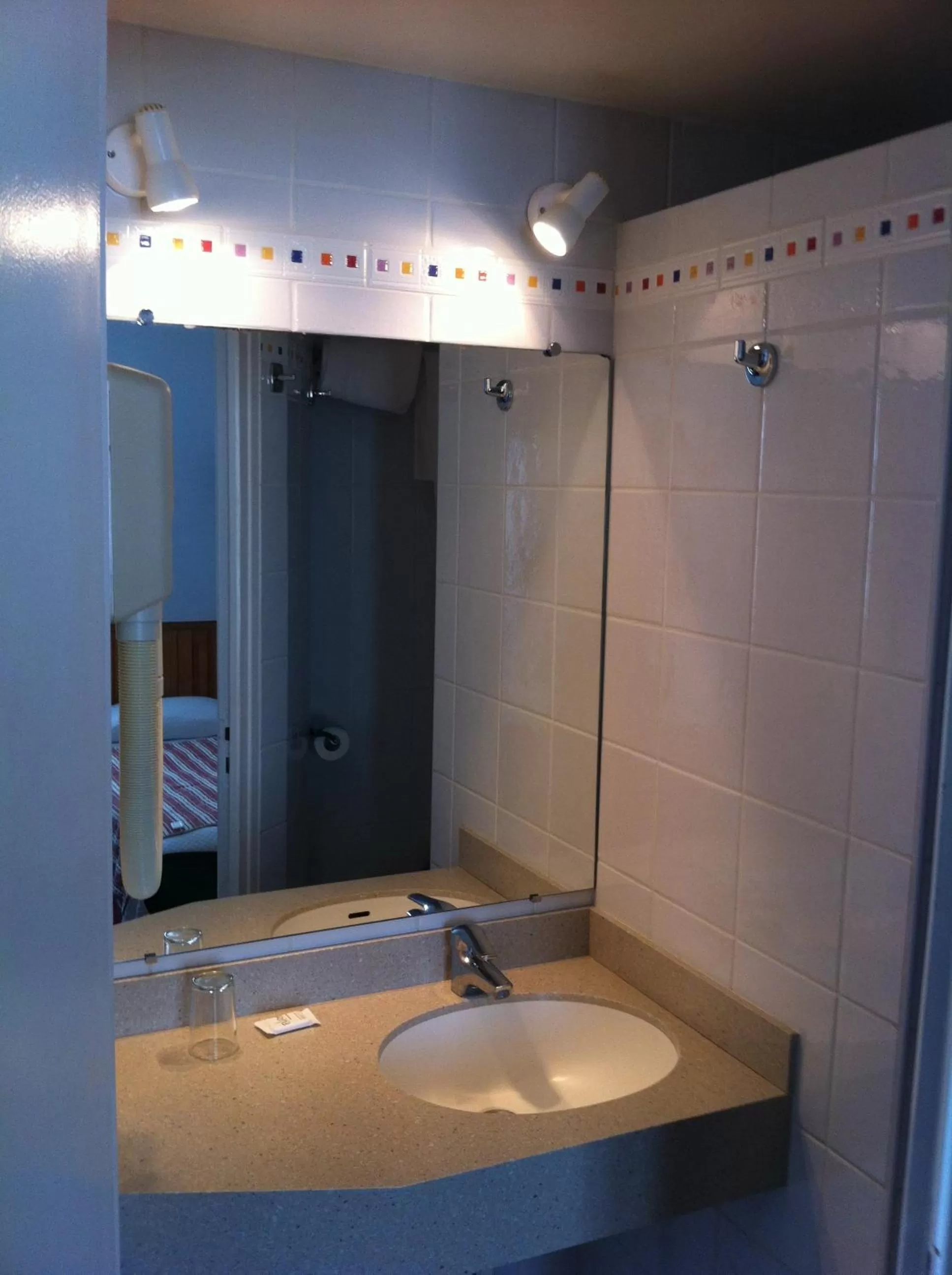 Bathroom in Hôtel du Cygne Paris