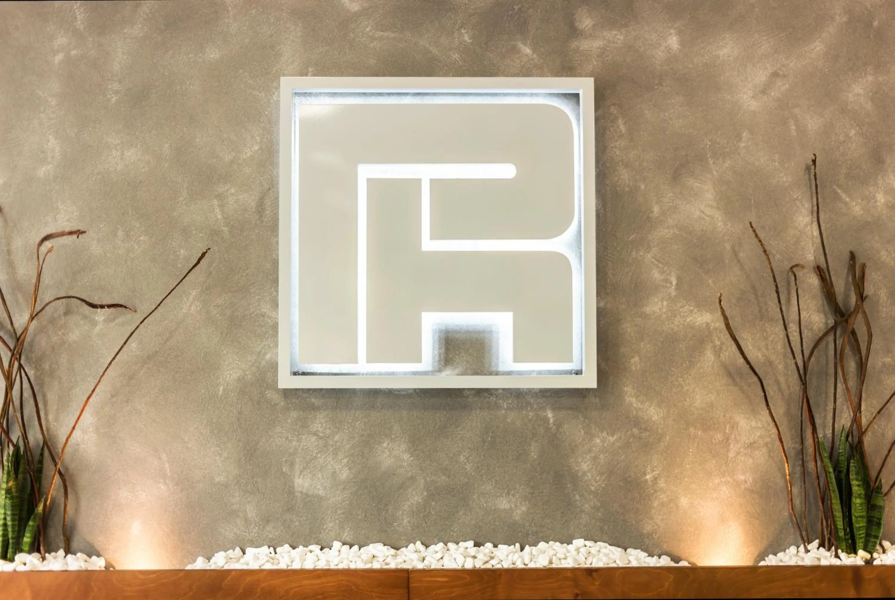 Property logo or sign in Pan Hotel