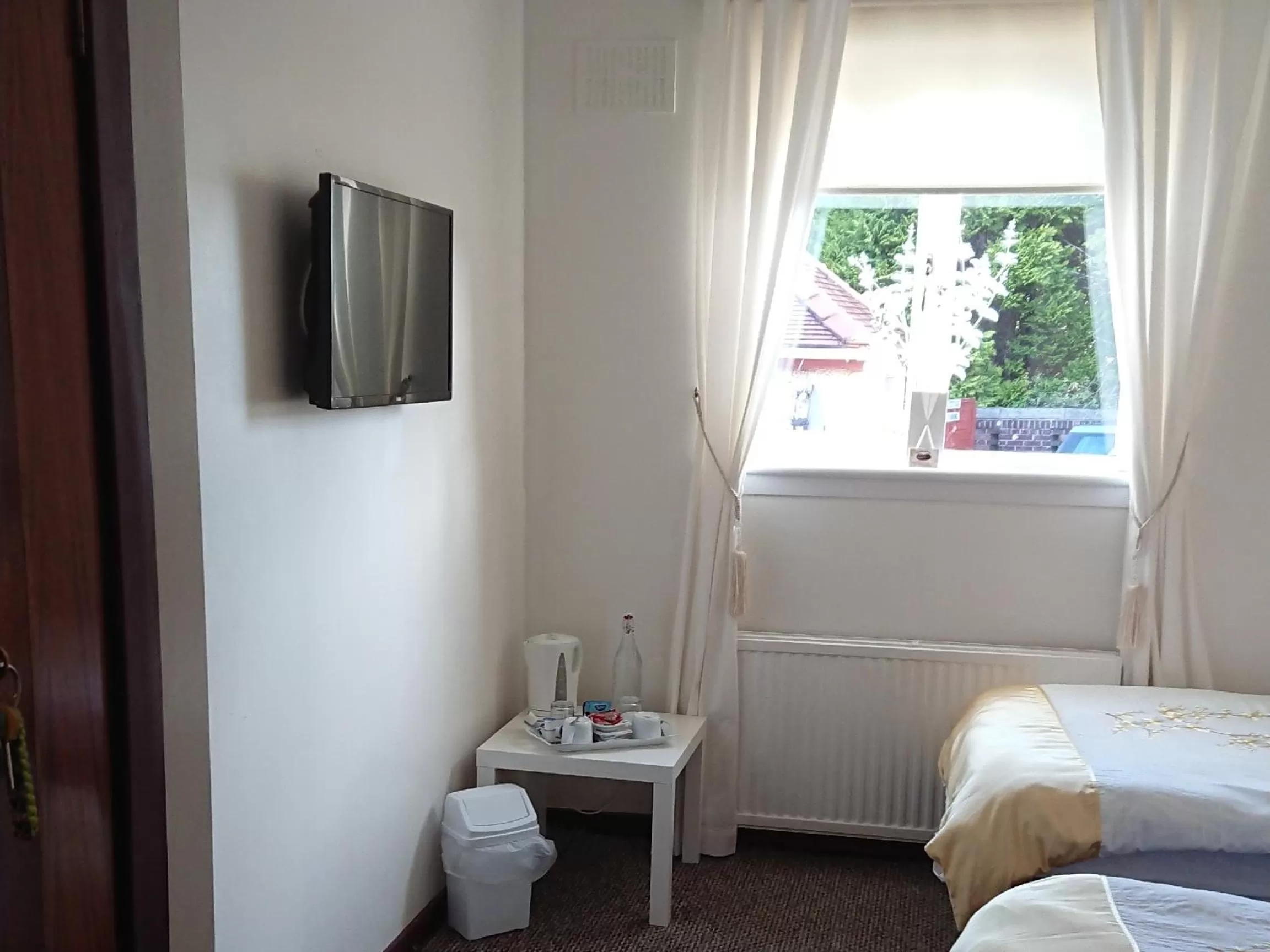 Bedroom, Bed in Glenfern Guest House and a separate Cottage with its own private hot tub