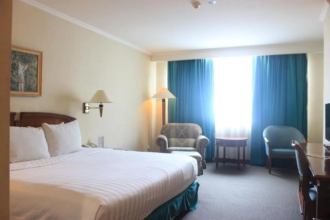 Bed in Grand Arkenso Park View