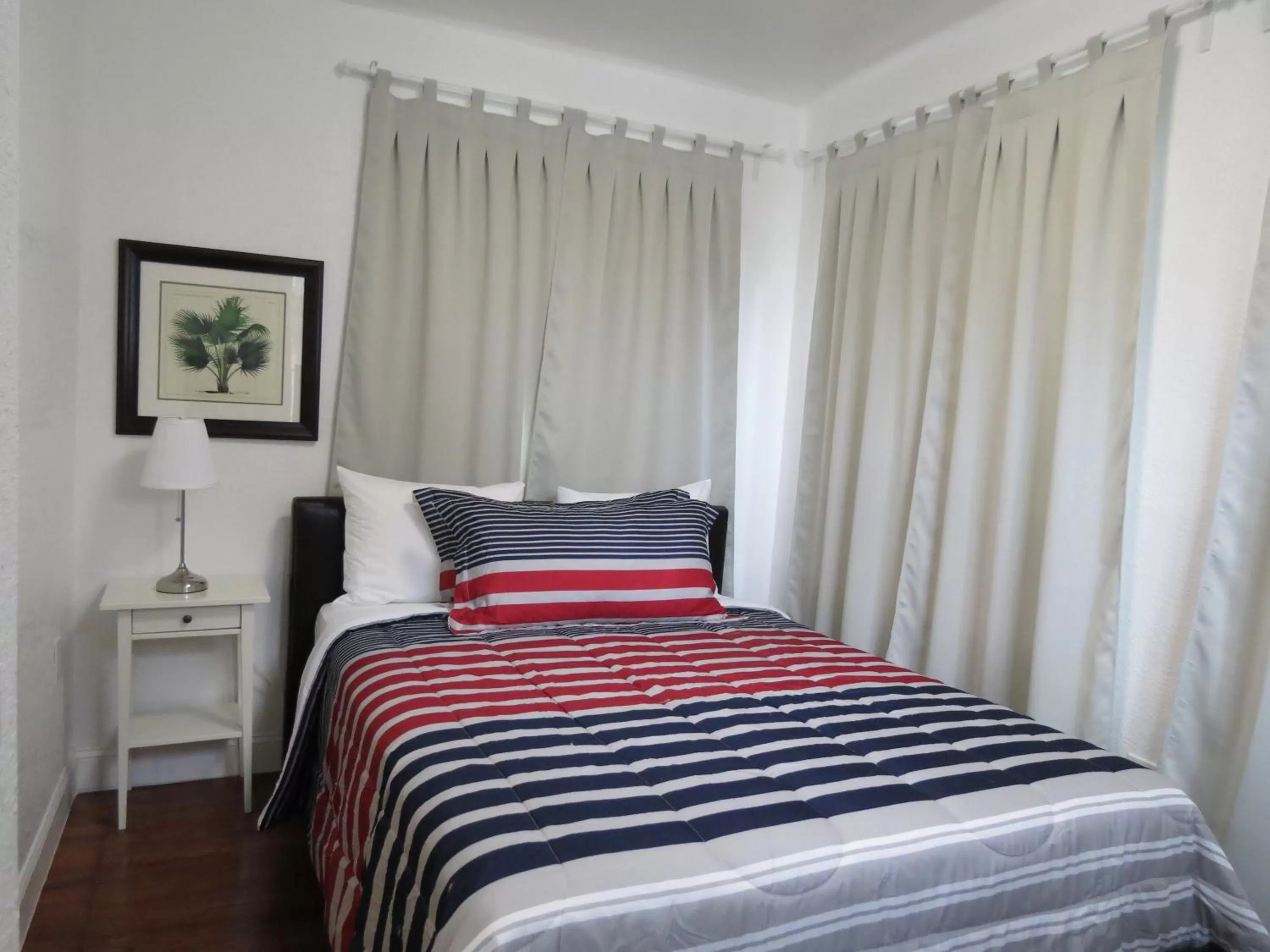 Bed in Harding Boutique Apartments