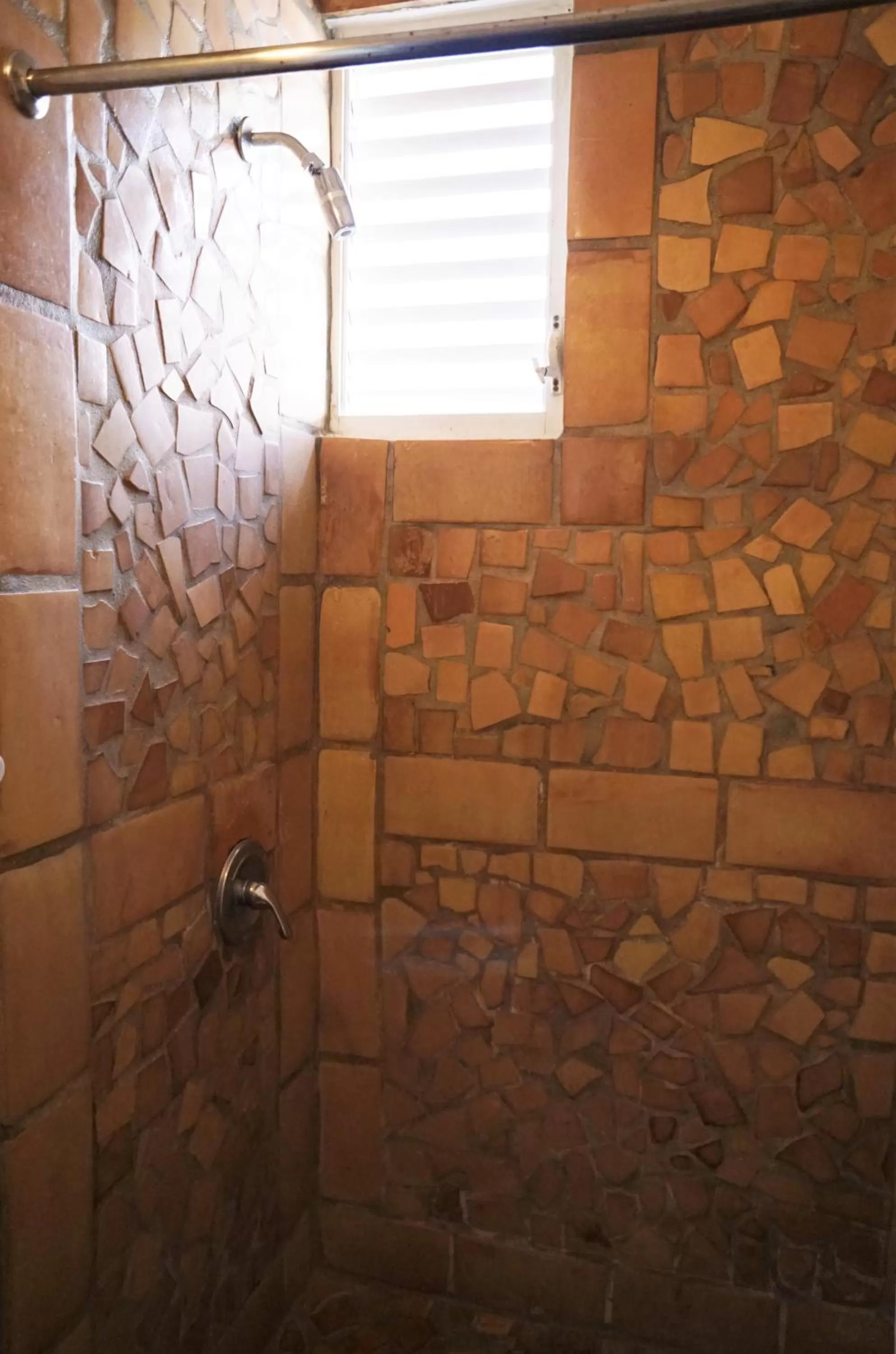 Shower in At Wind Chimes Boutique Hotel