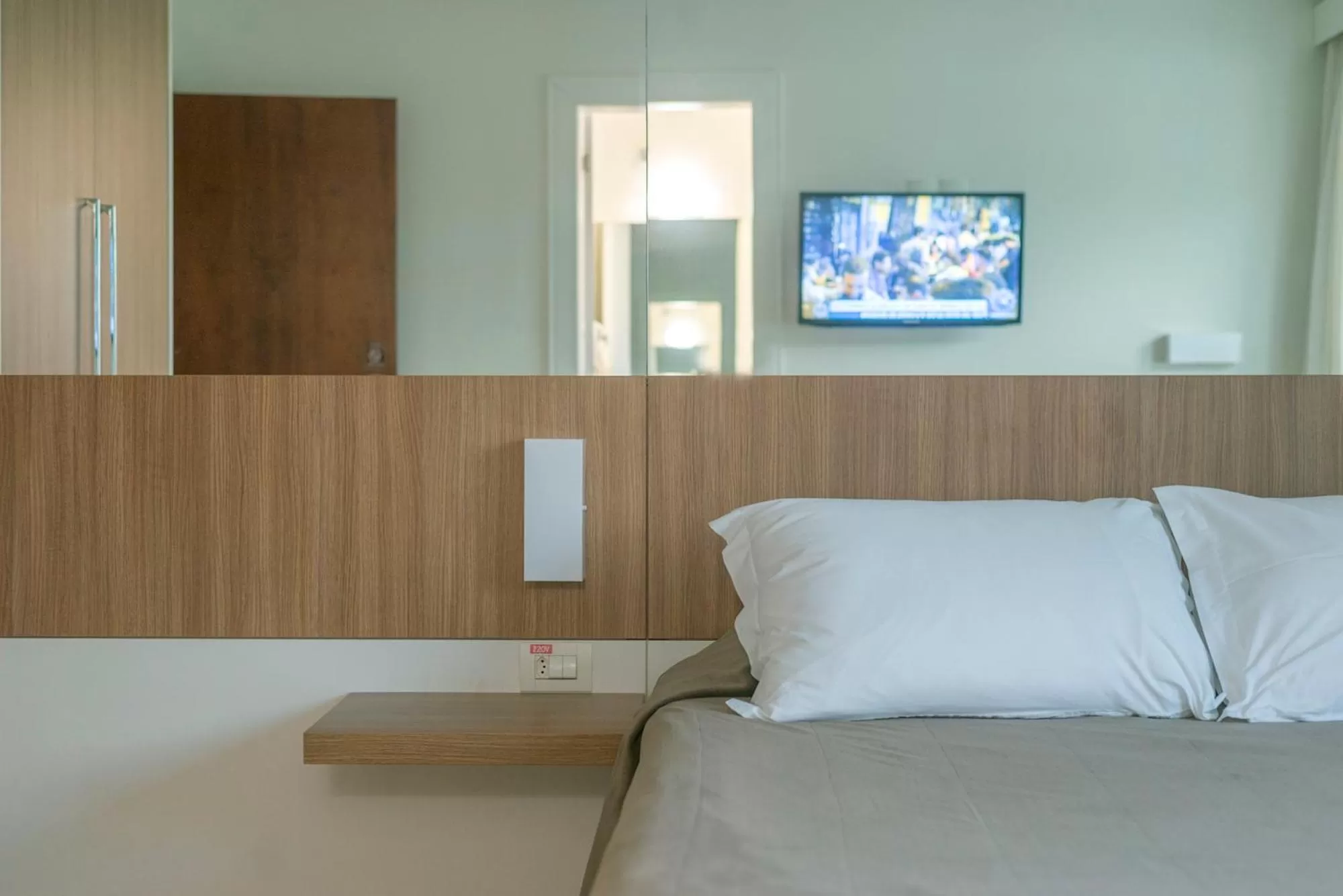 Bed in Hotel Glória